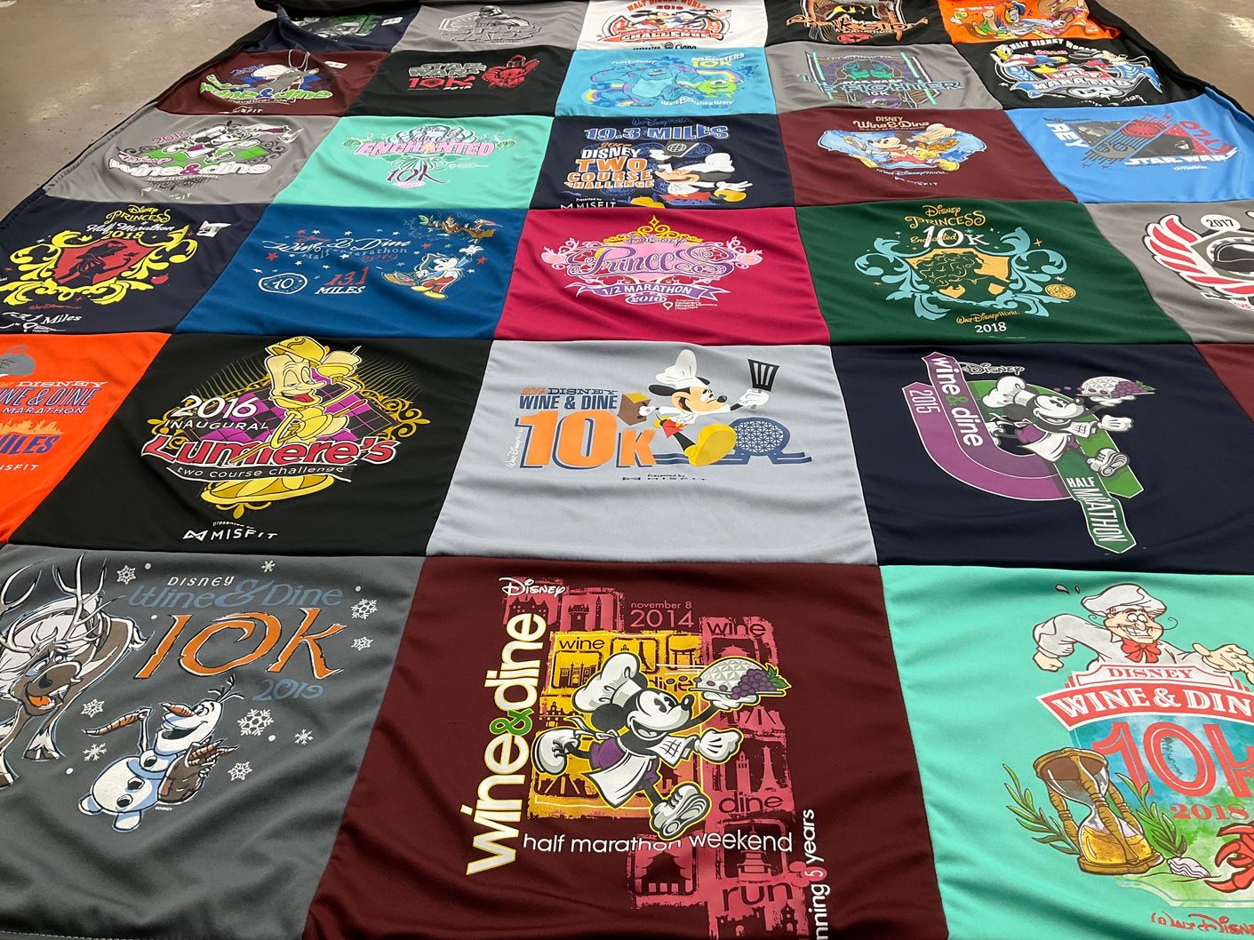 T-shirt quilt with running, disney themes by Terri from GA