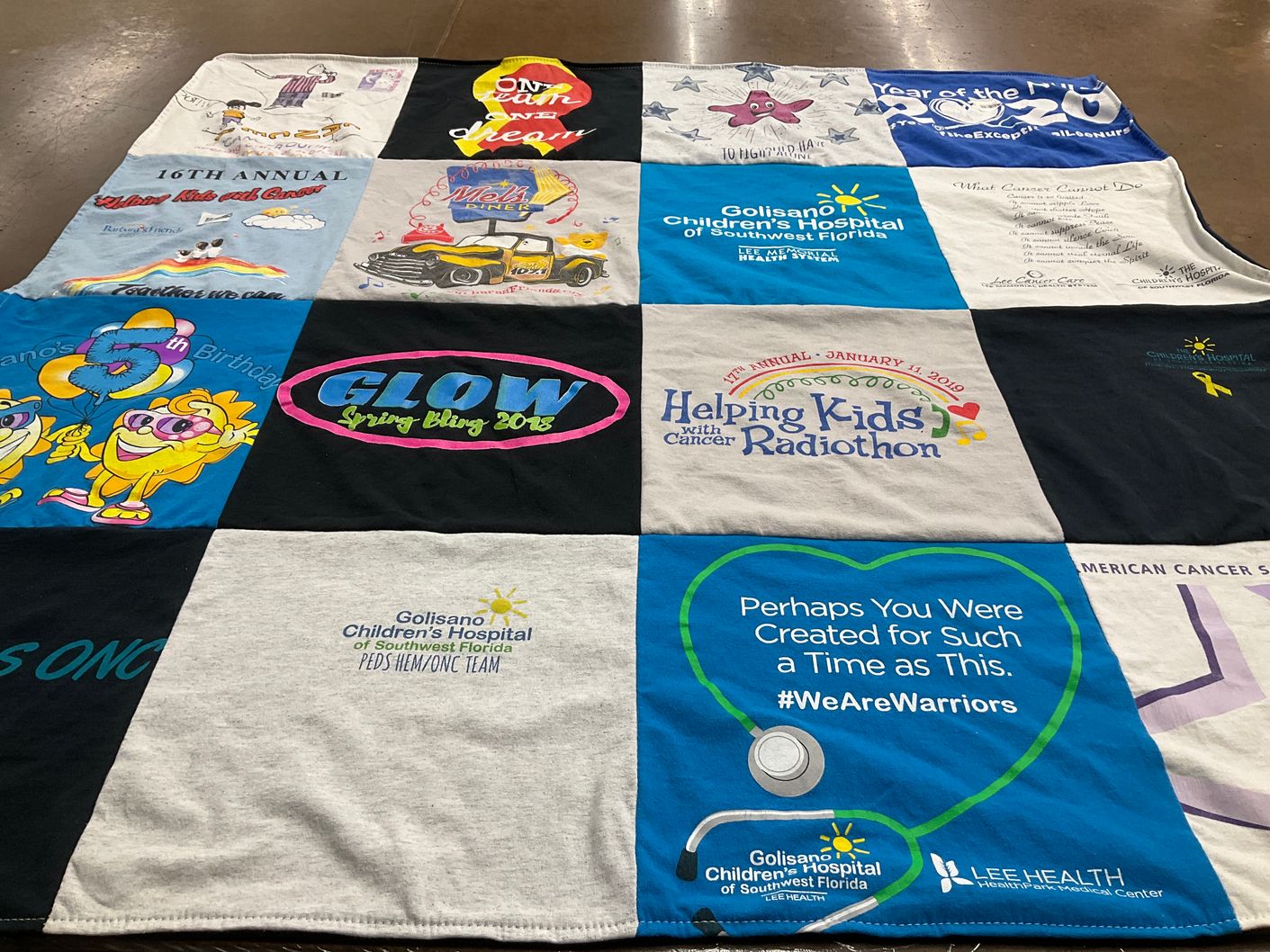 T-shirt quilt with healthcare, cancer awareness themes by Laura from FL