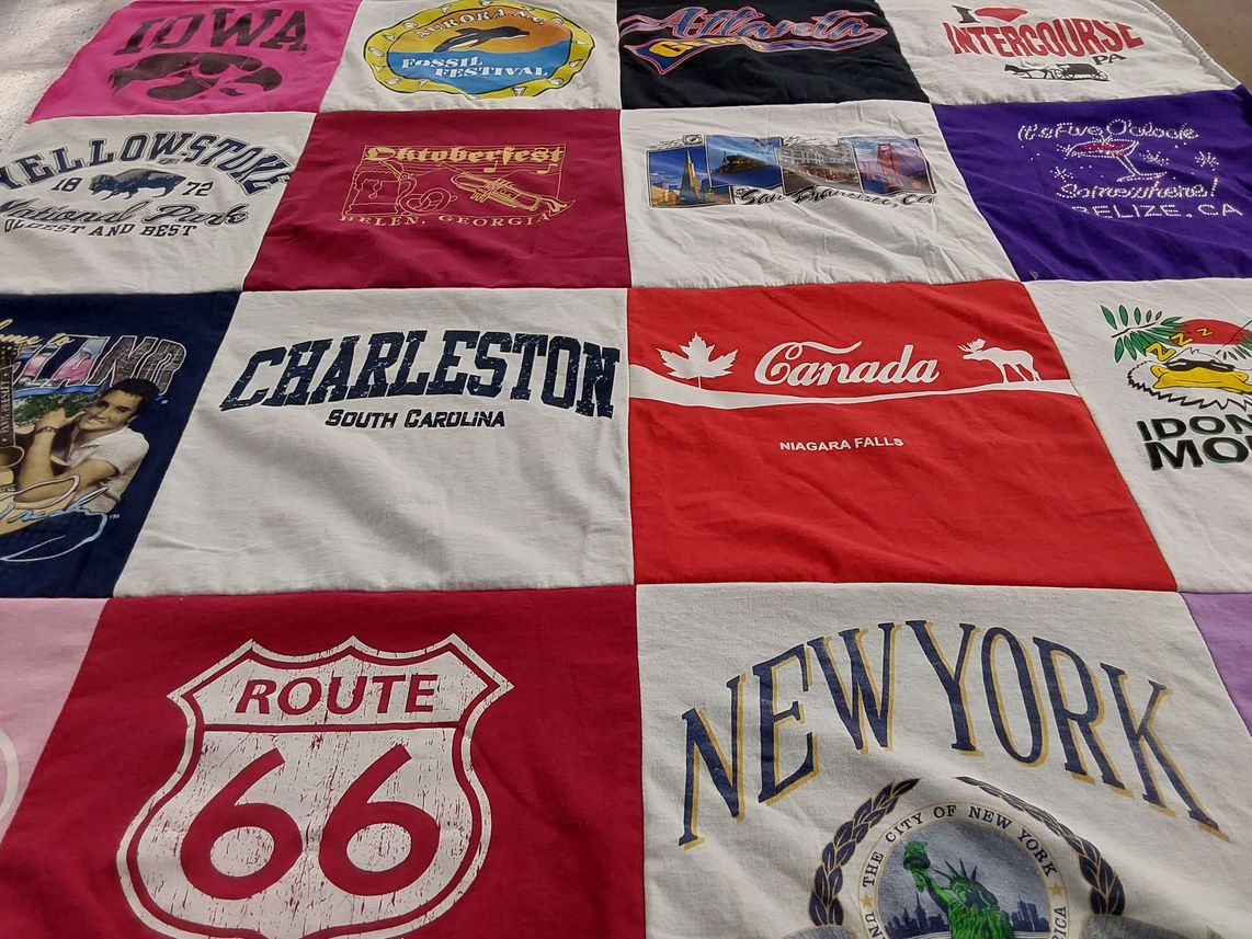 T-shirt quilt with travel, tourism themes by Phyllis from GA