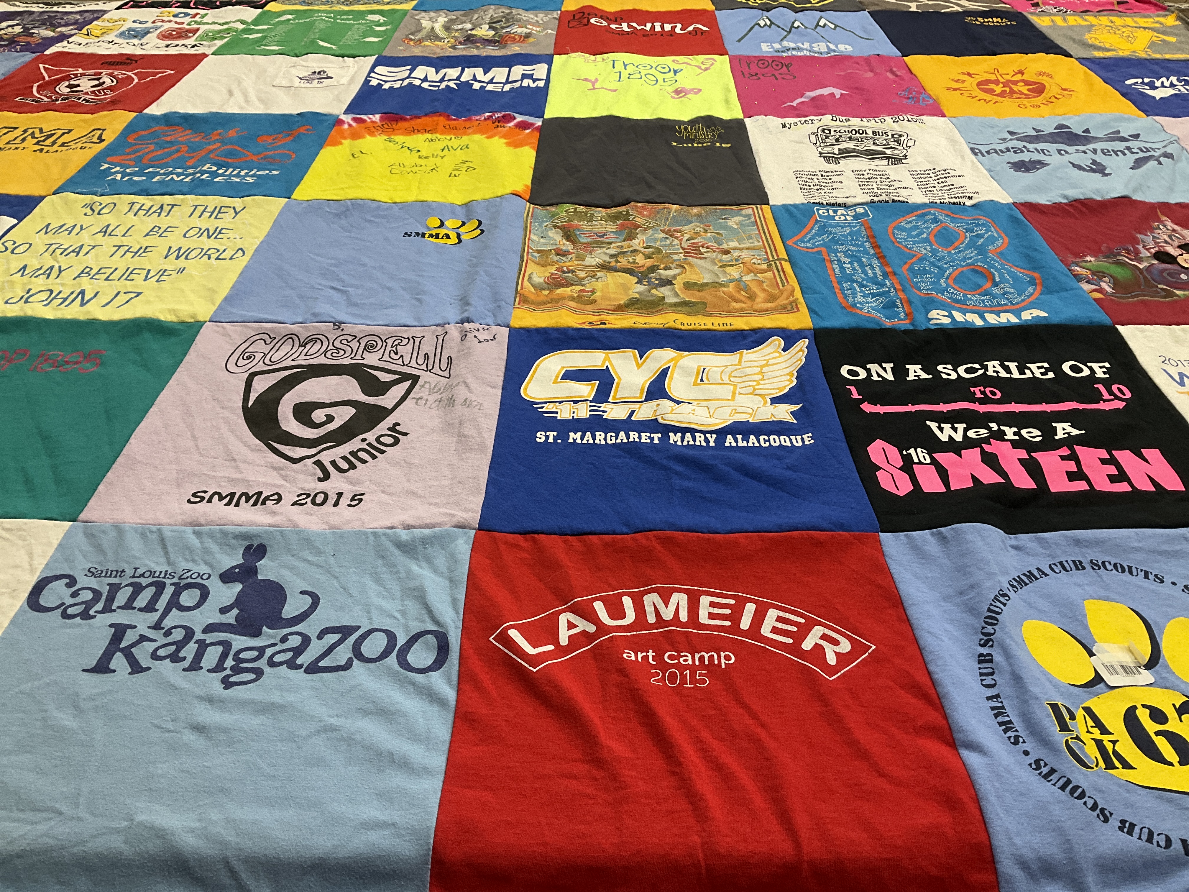 T-shirt quilt featuring saint margaret mary alacoque track team by Noel from MO