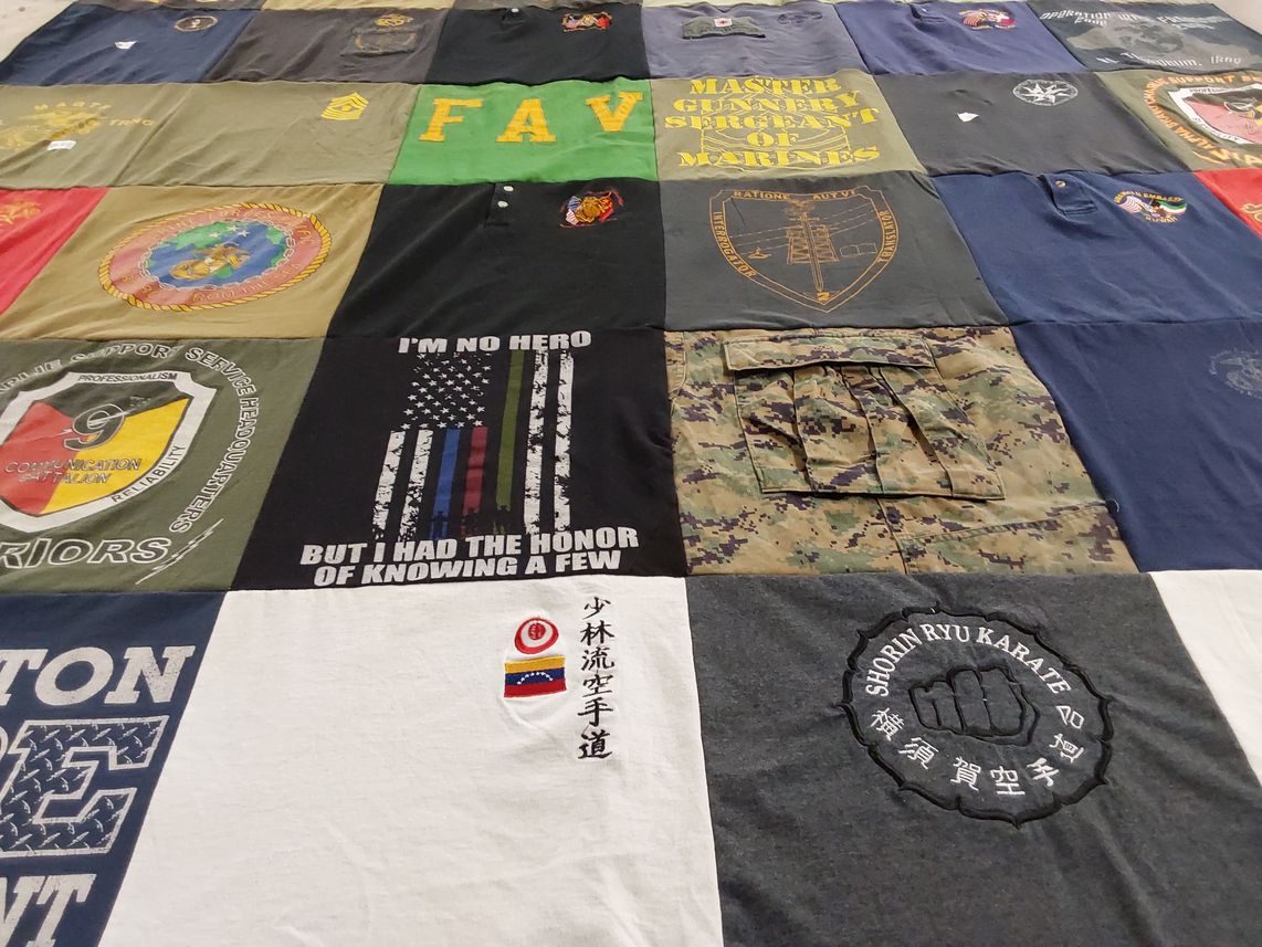 T-shirt quilt with military, martial arts themes by ROSA from CA