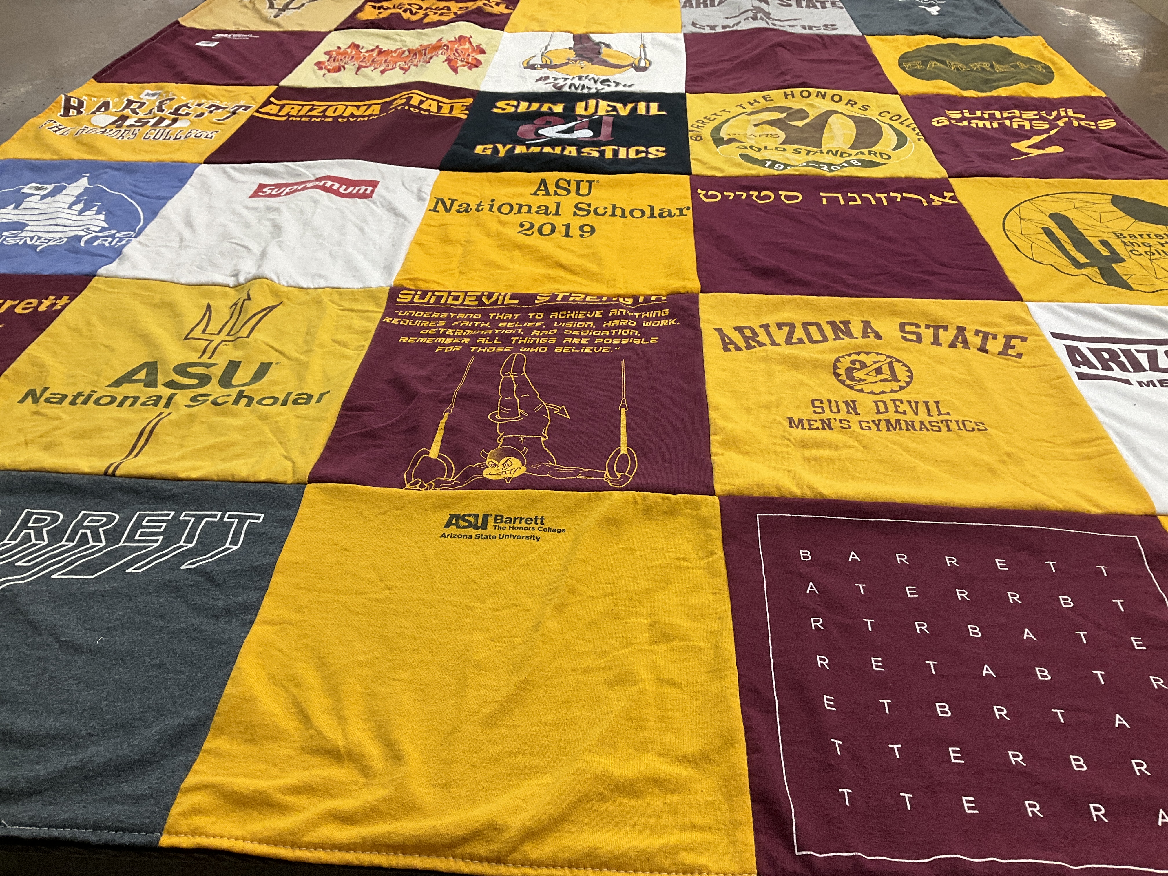 Custom Project Repat t-shirt quilt featuring shirts from arizona state university.