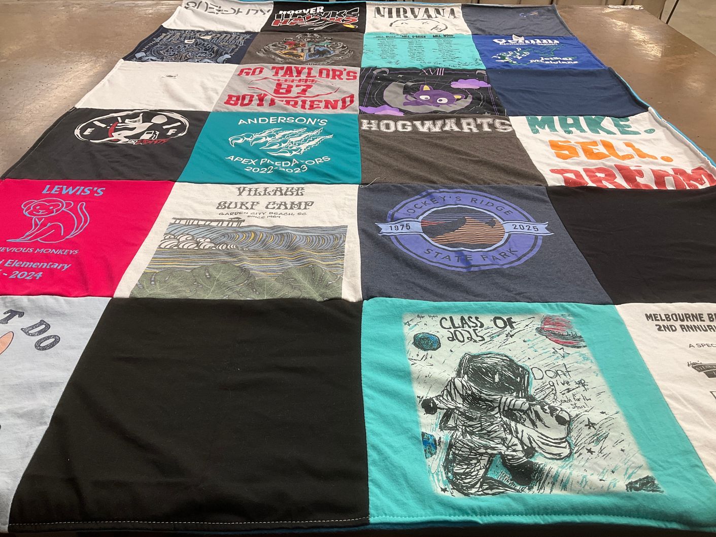 T-shirt quilt featuring apex predators by Laura from FL