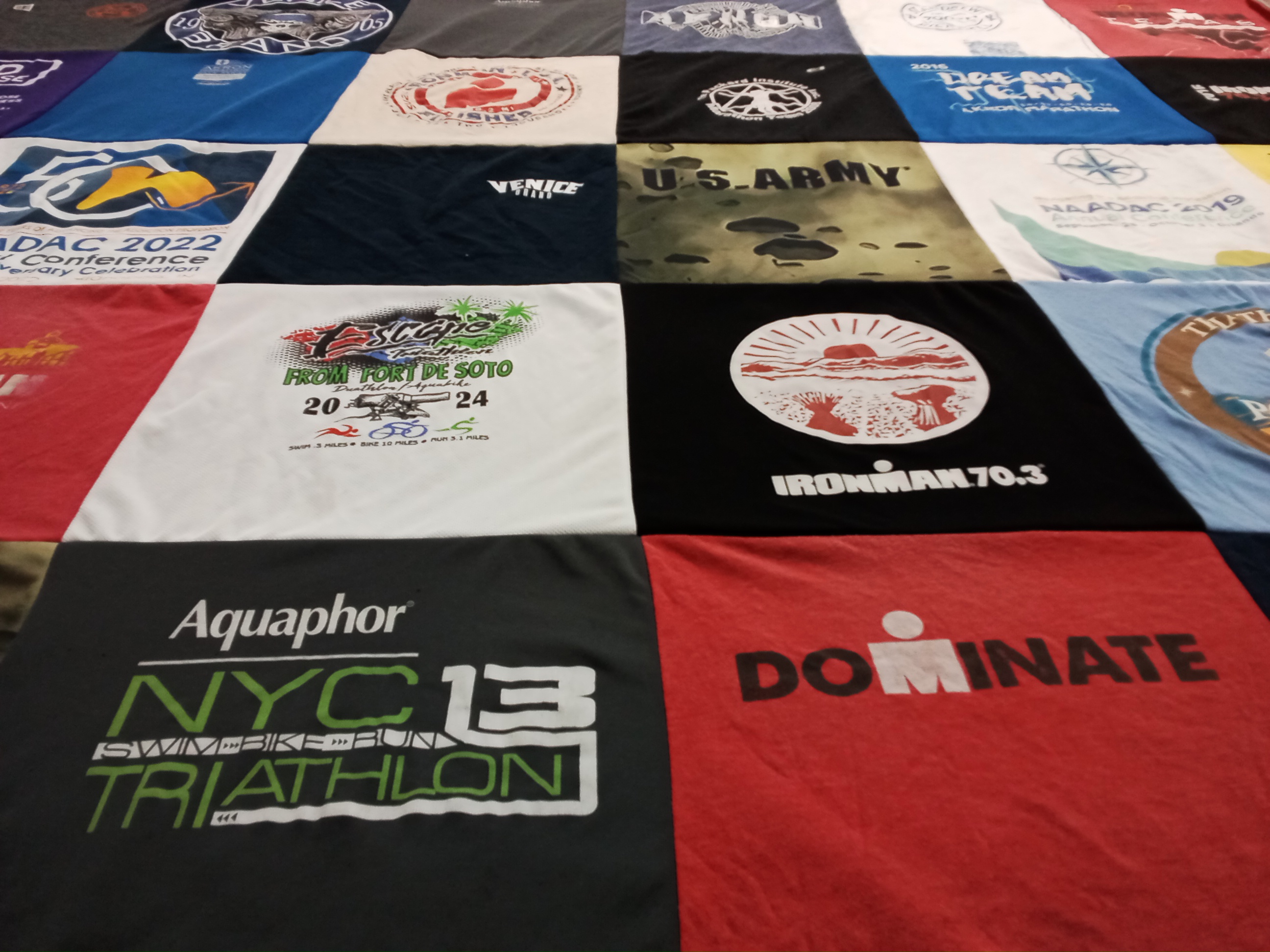 T-shirt quilt with triathlons, athletics themes by Raynard from OH