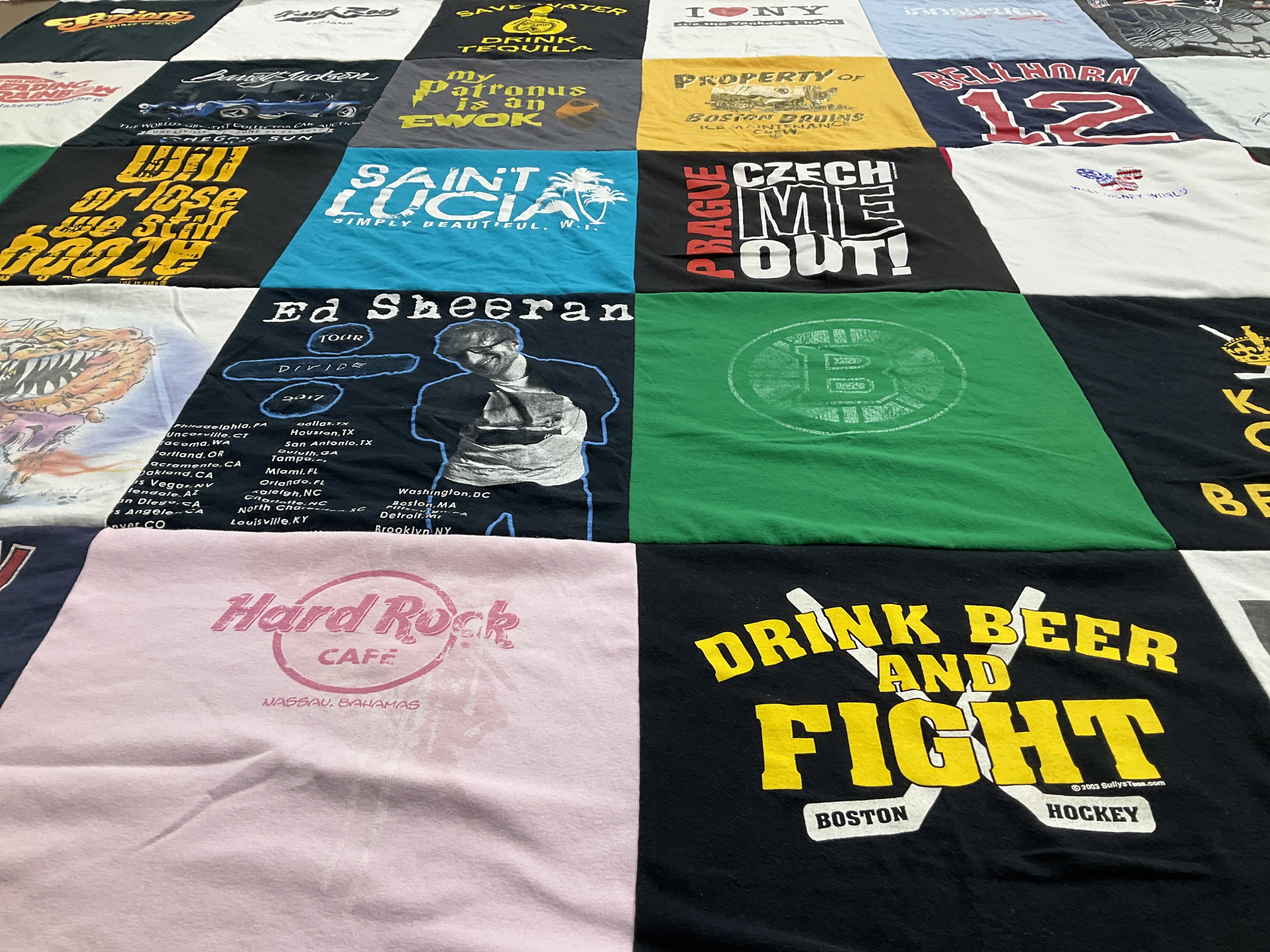 Custom Project Repat t-shirt quilt with boston bruins team logos.