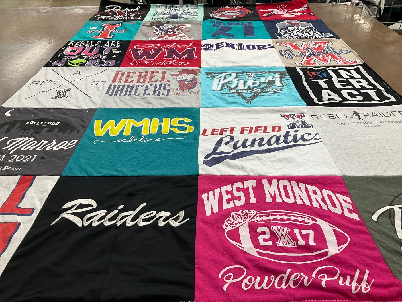 T-shirt quilt featuring raiders, rebels by Michelle from LA