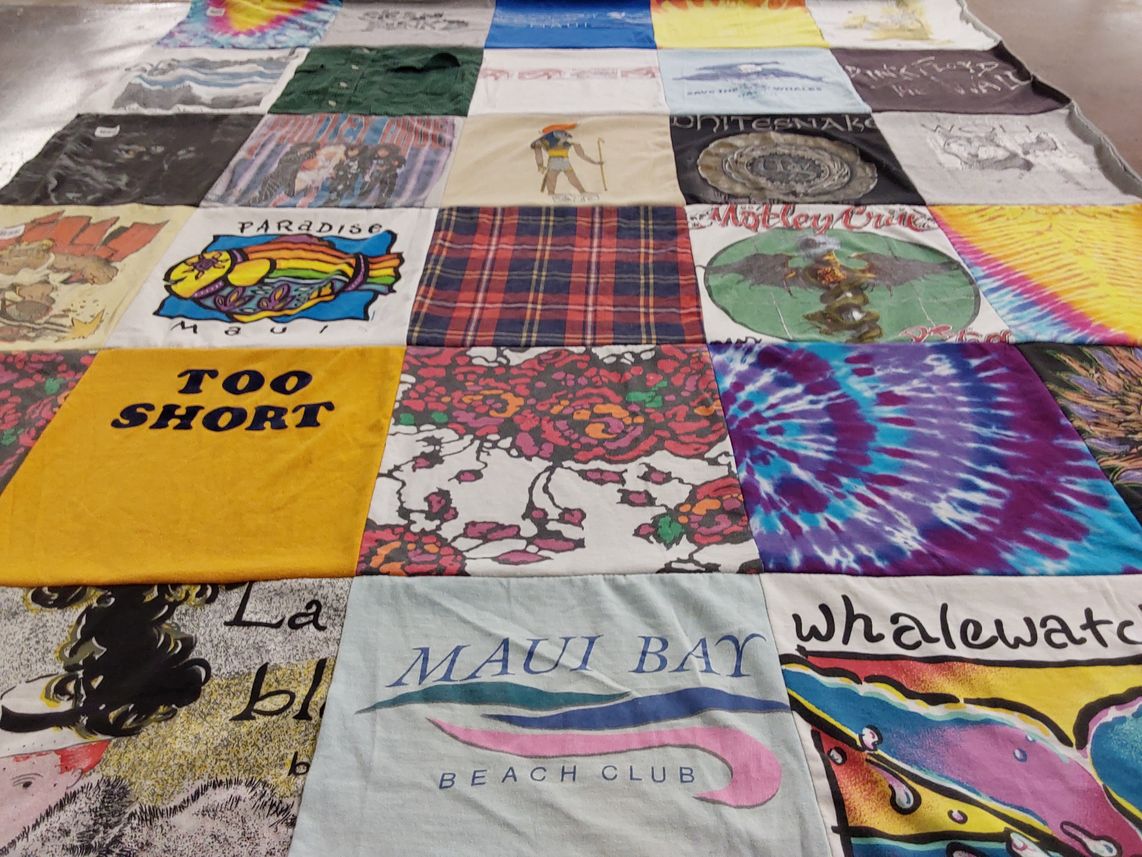 T-shirt quilt with beach, music themes by Sara from MT