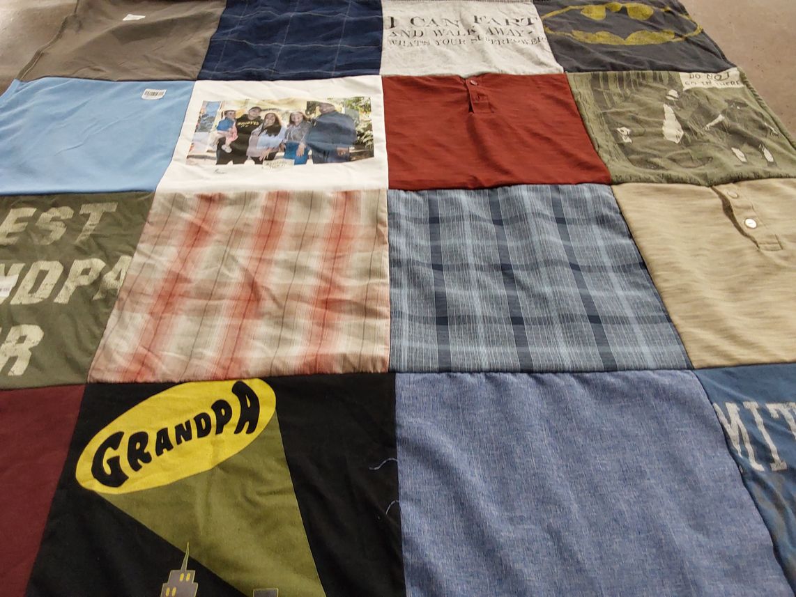 T-shirt quilt with family, superheroes themes by Miriam from CA