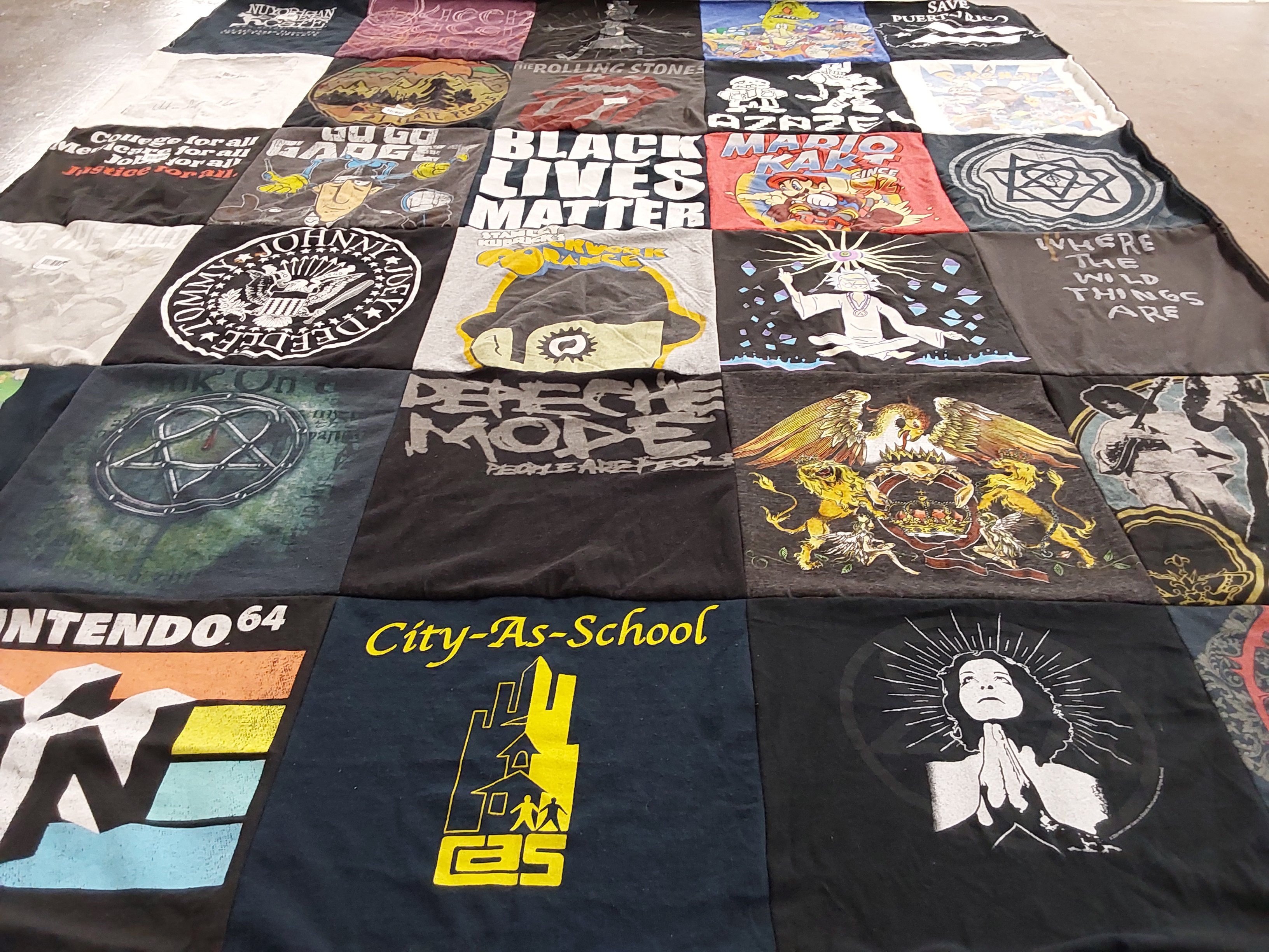 T-shirt quilt with music, gaming themes by Yesenia from NY