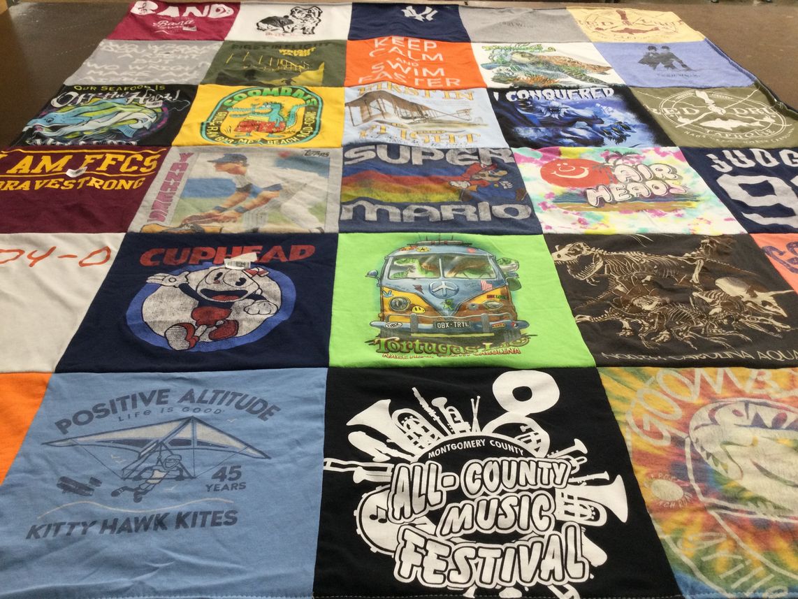 T-shirt quilt with music, video games themes by Amy from NY