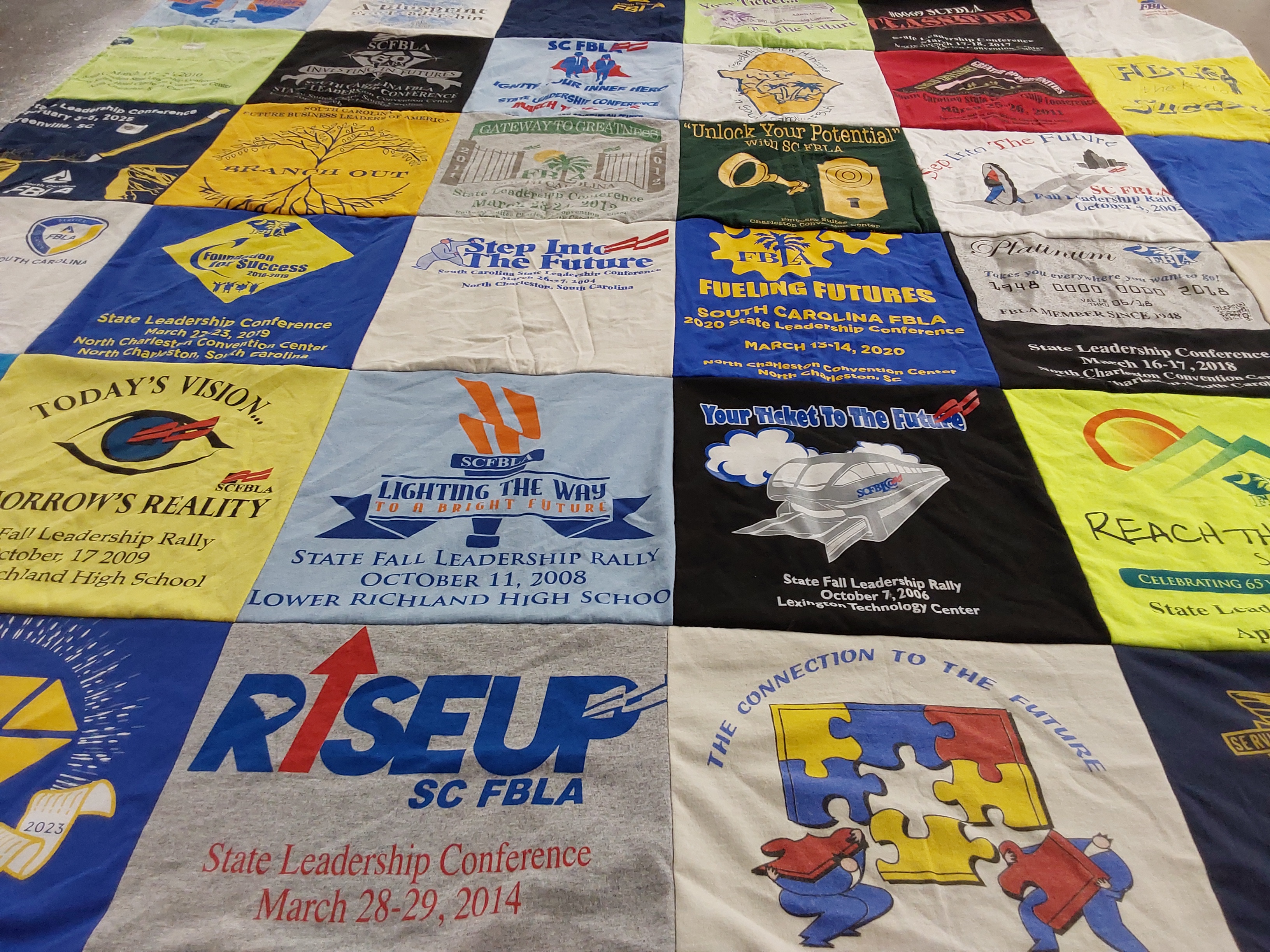 Custom Project Repat t-shirt quilt featuring shirts from lower richland high school, lexington technology center.