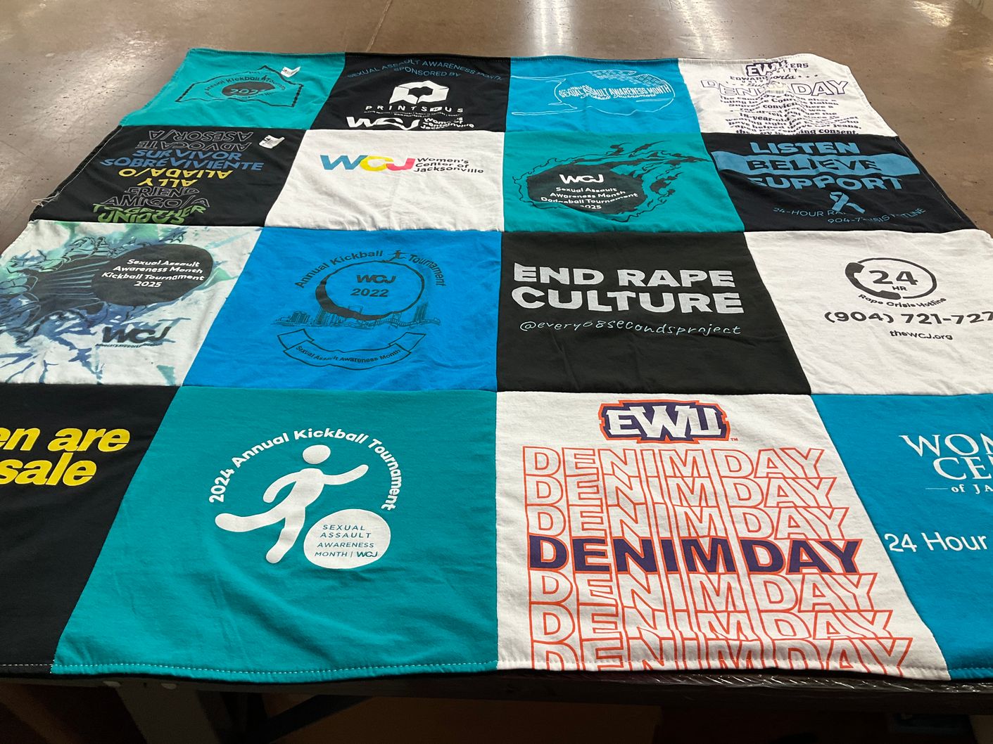 T-shirt quilt with sexual assault awareness, support for survivors themes by Theresa from FL