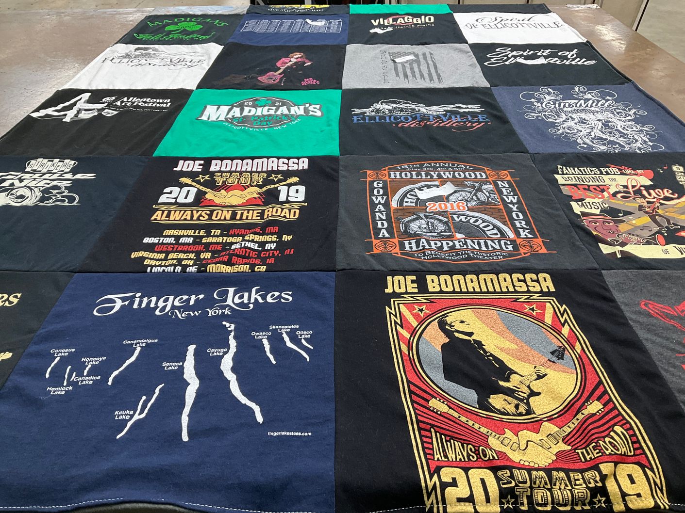 T-shirt quilt with music, festivals themes by Nancy from NY