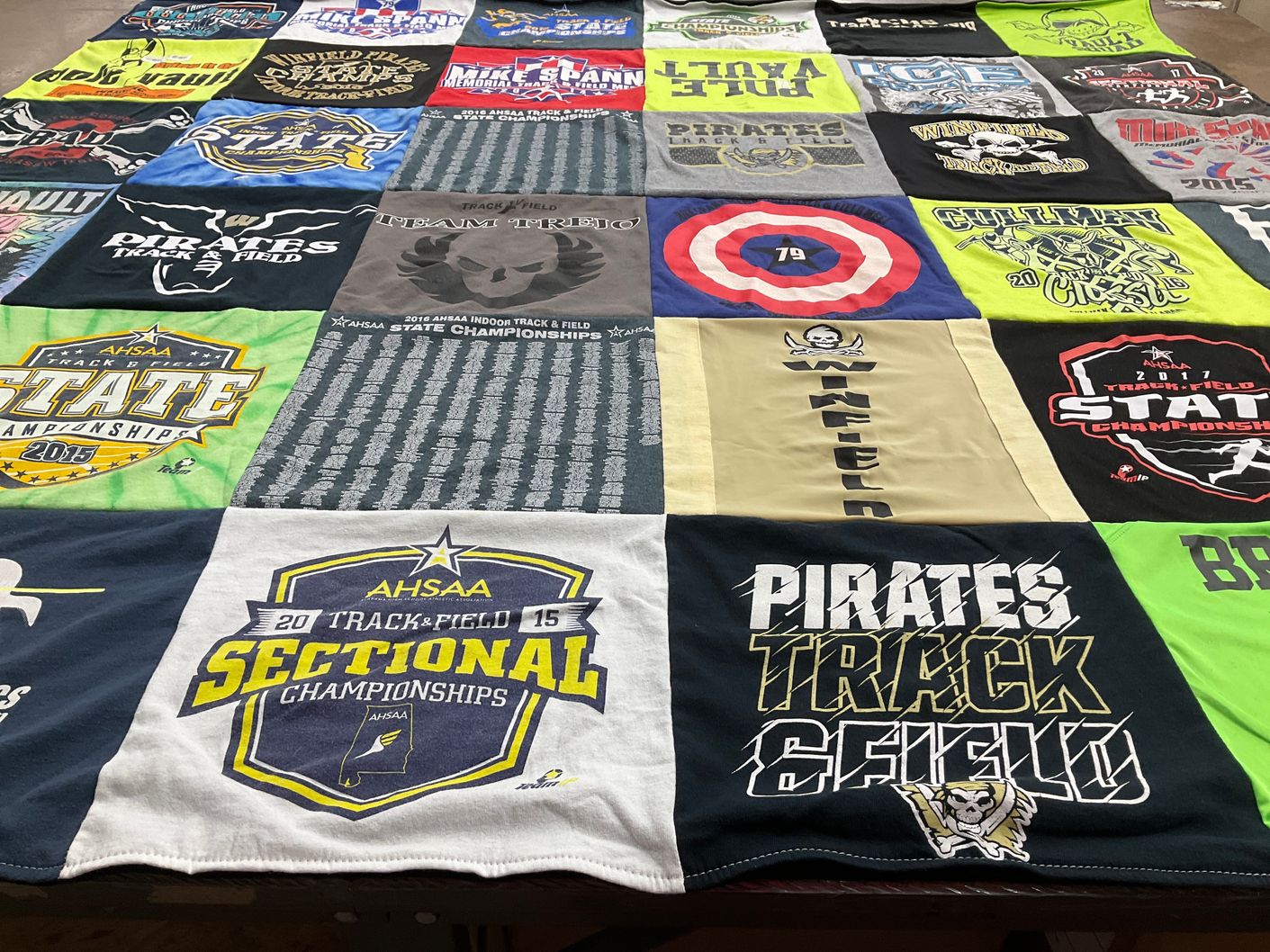 T-shirt quilt with sports, track and field themes by Debbie from AL
