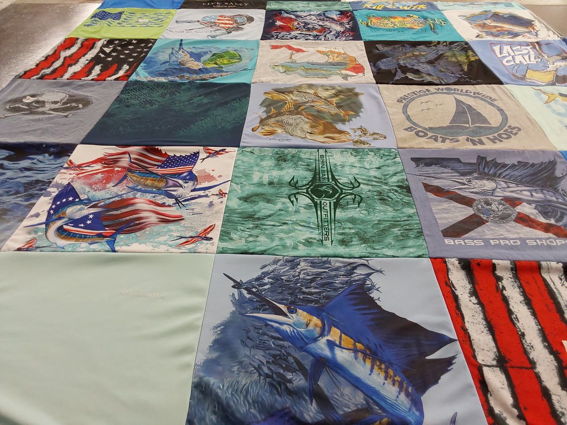 T-shirt quilt with fishing, marine life themes by jamie from FL