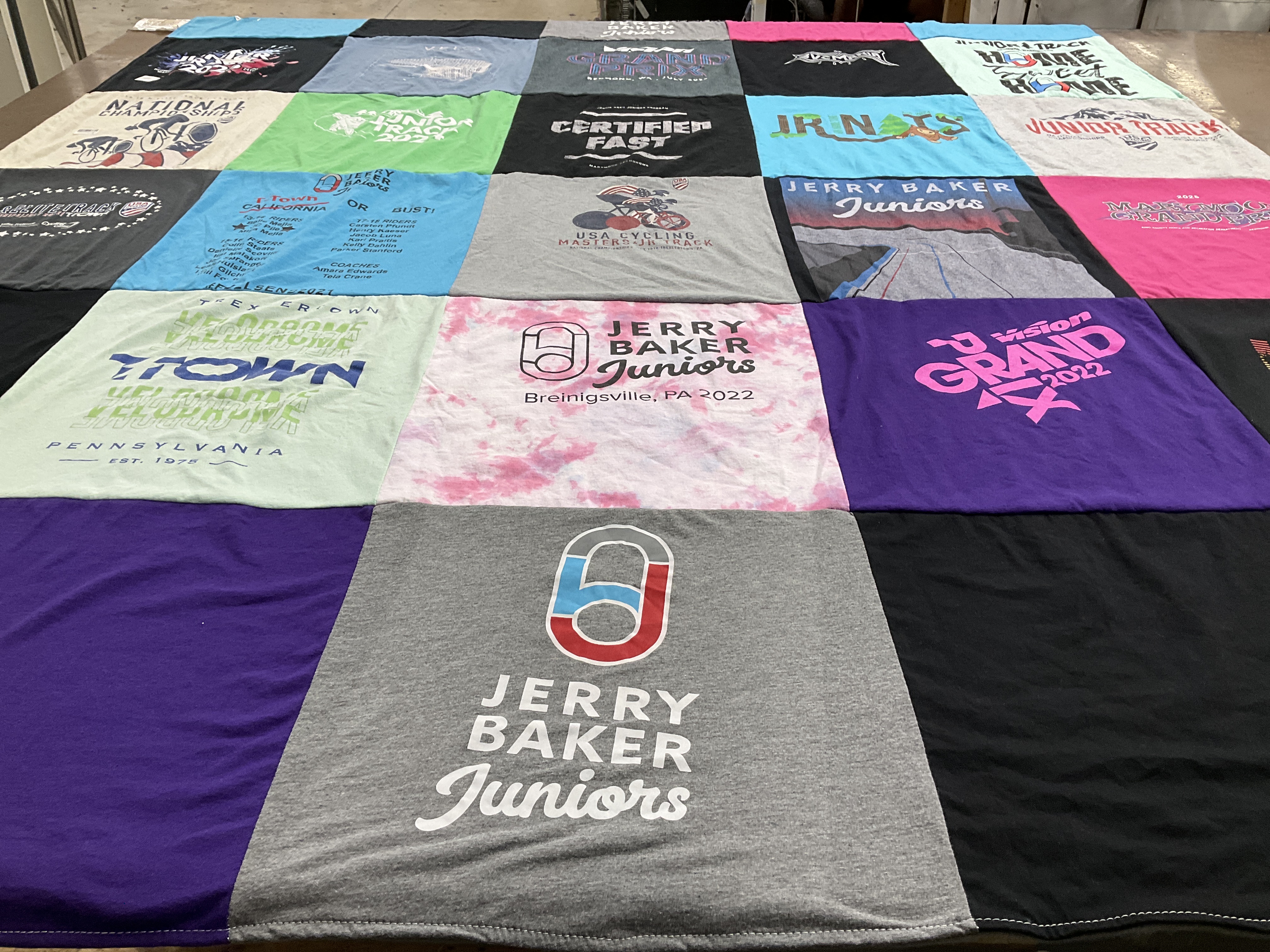 T-shirt quilt with cycling, track and field themes by Tammy from WA