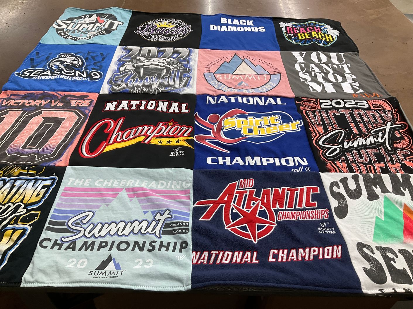 T-shirt quilt with cheerleading, sports themes by Amy from PA