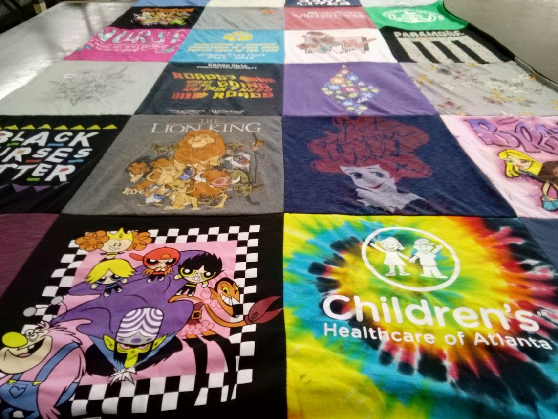 T-shirt quilt with cartoons, animation themes by Tyra from GA