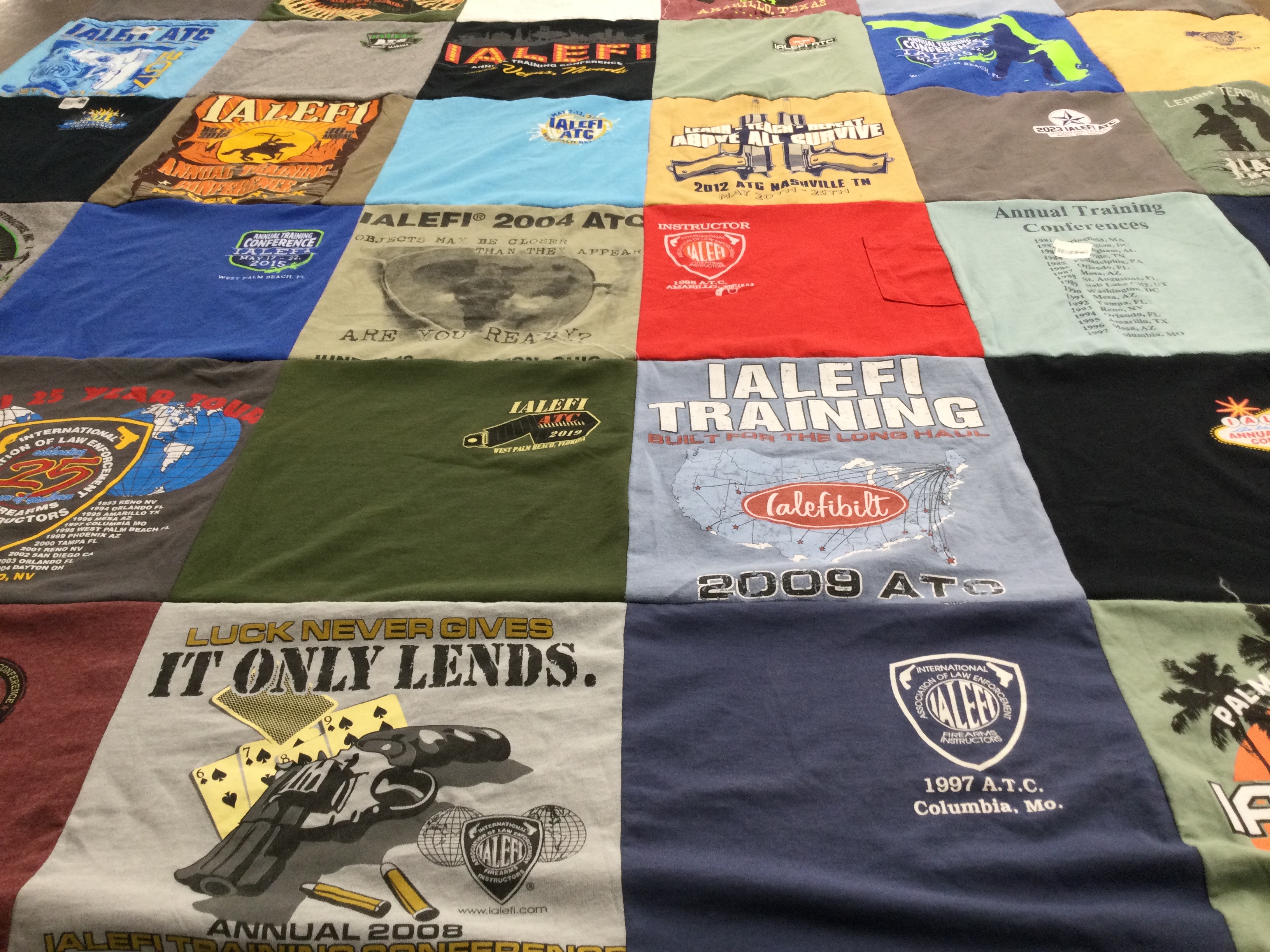 T-shirt quilt with law enforcement, training themes by Robert from NC