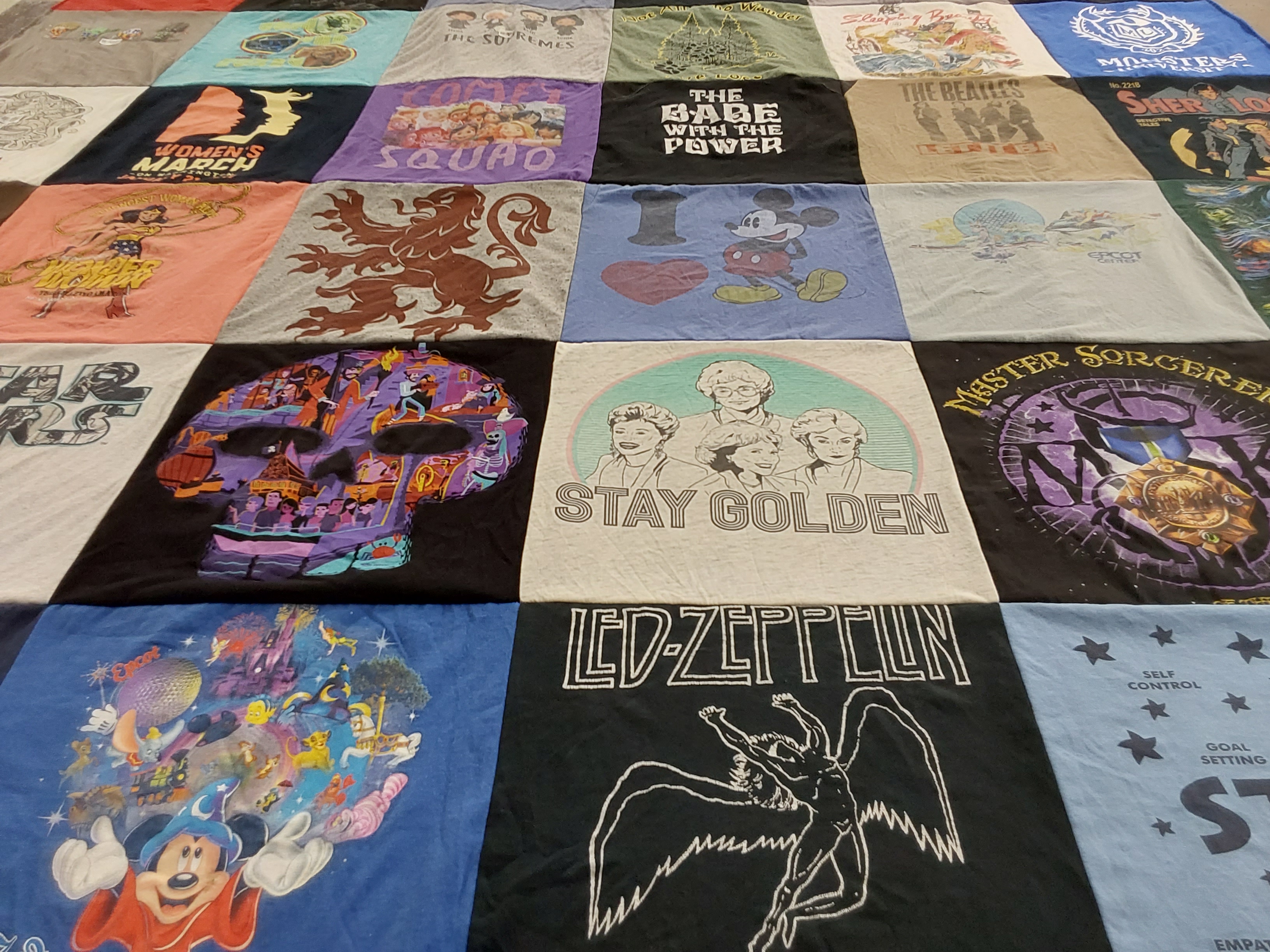 T-shirt quilt with music, disney themes by Erin from OH