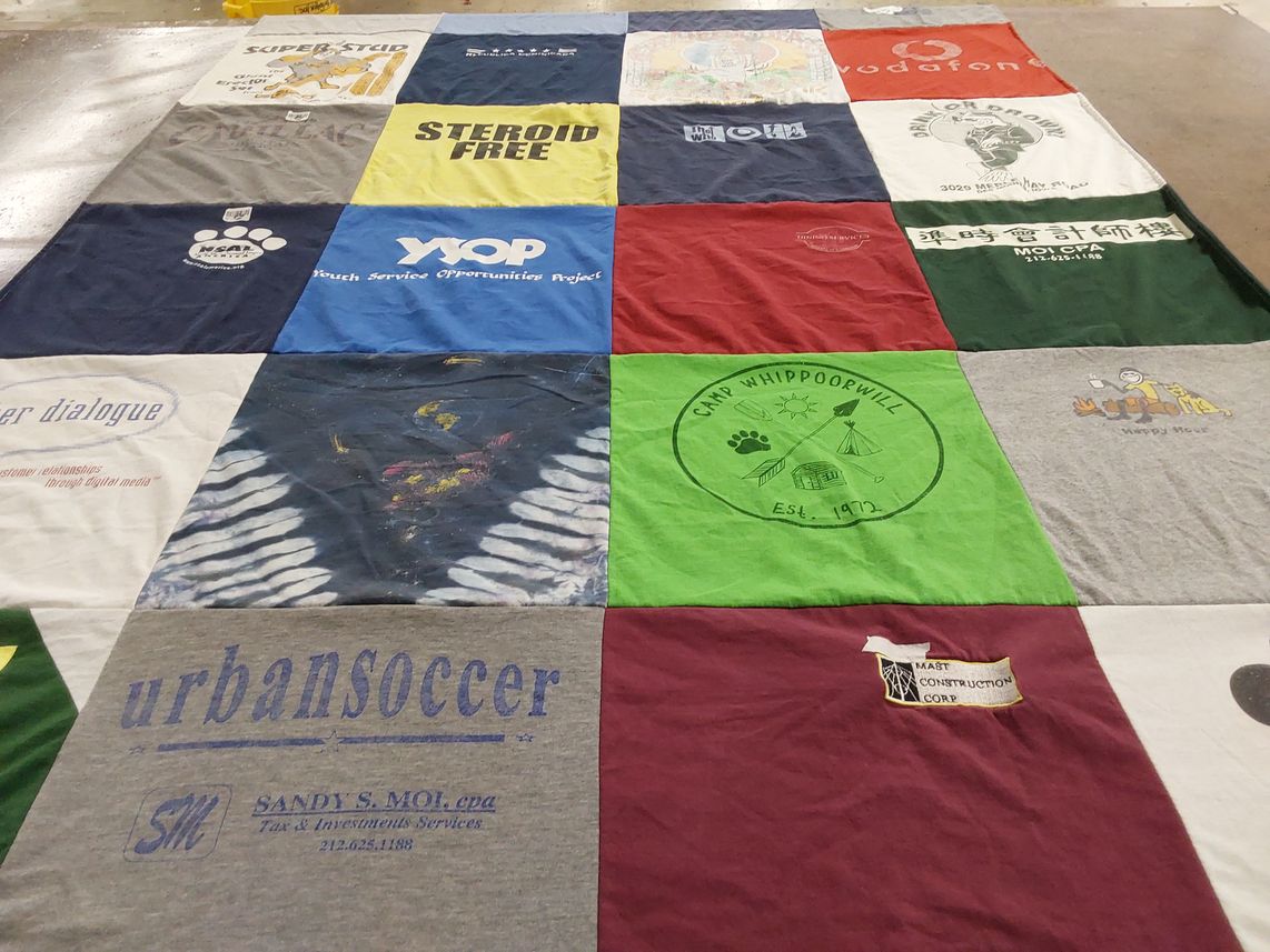 T-shirt quilt with sports, camping themes by Hilda from ME