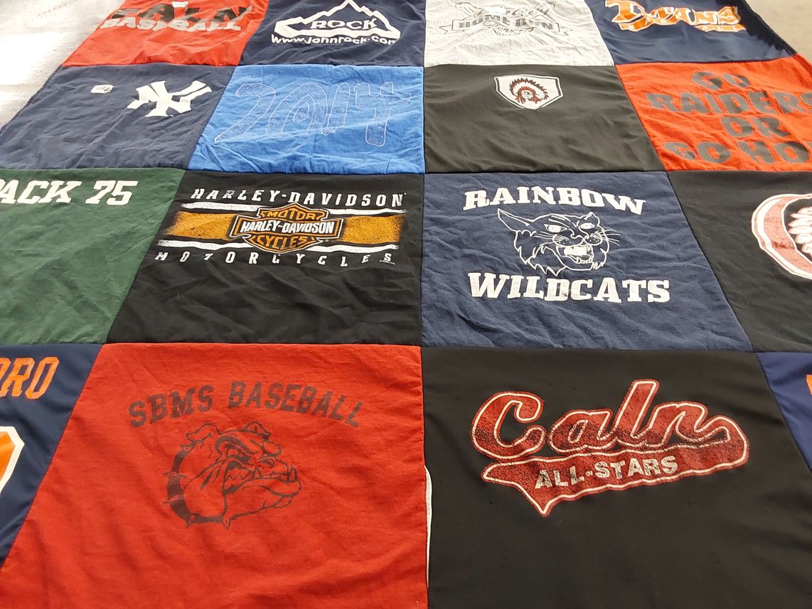 T-shirt quilt featuring rainbow wildcats by Carolyn from PA