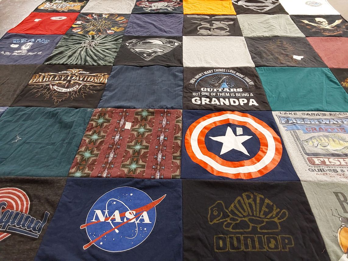 T-shirt quilt with guitars, fishing themes by Jessica from IL