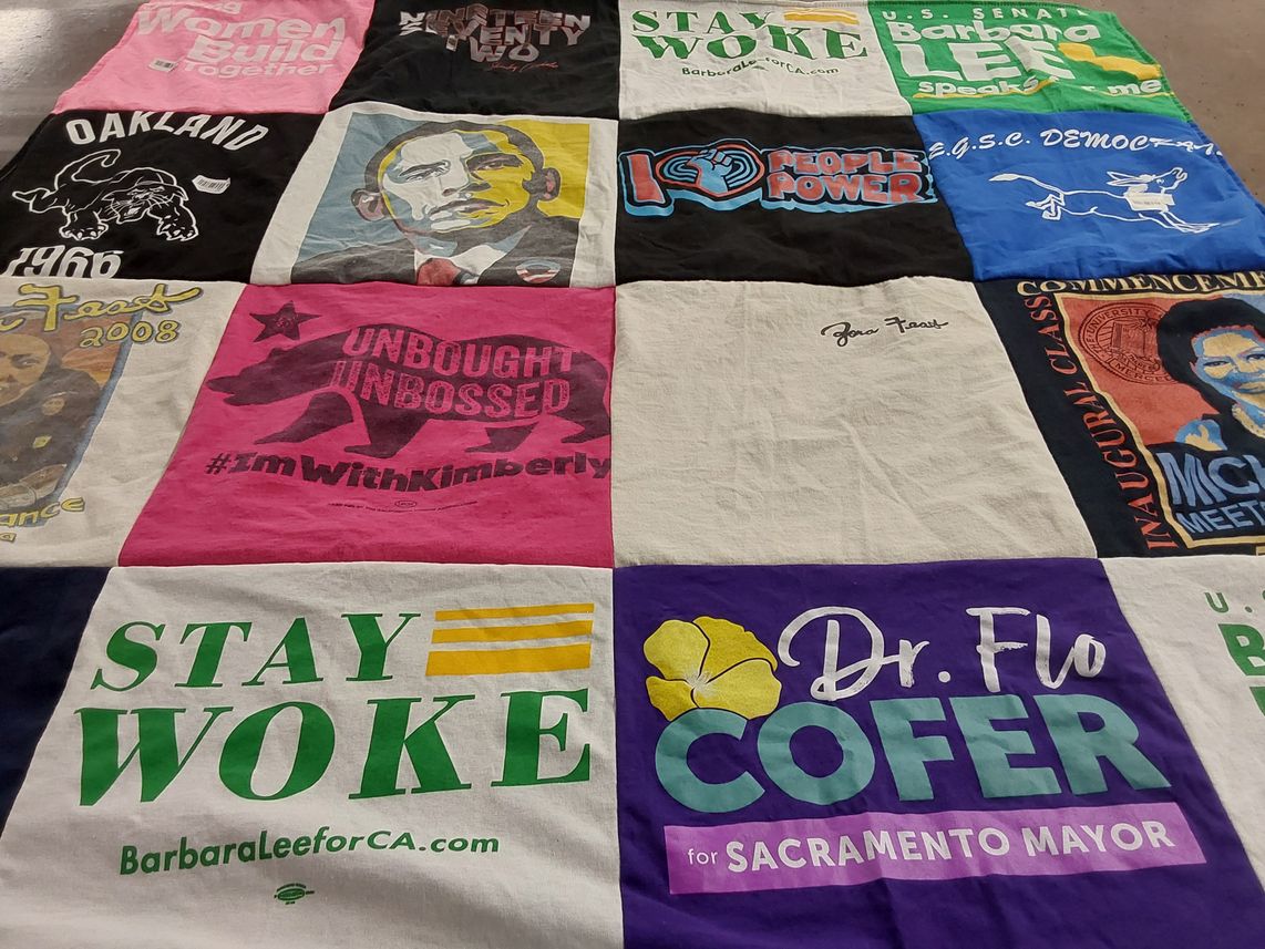 T-shirt quilt with politics, community themes by Kendra from CA