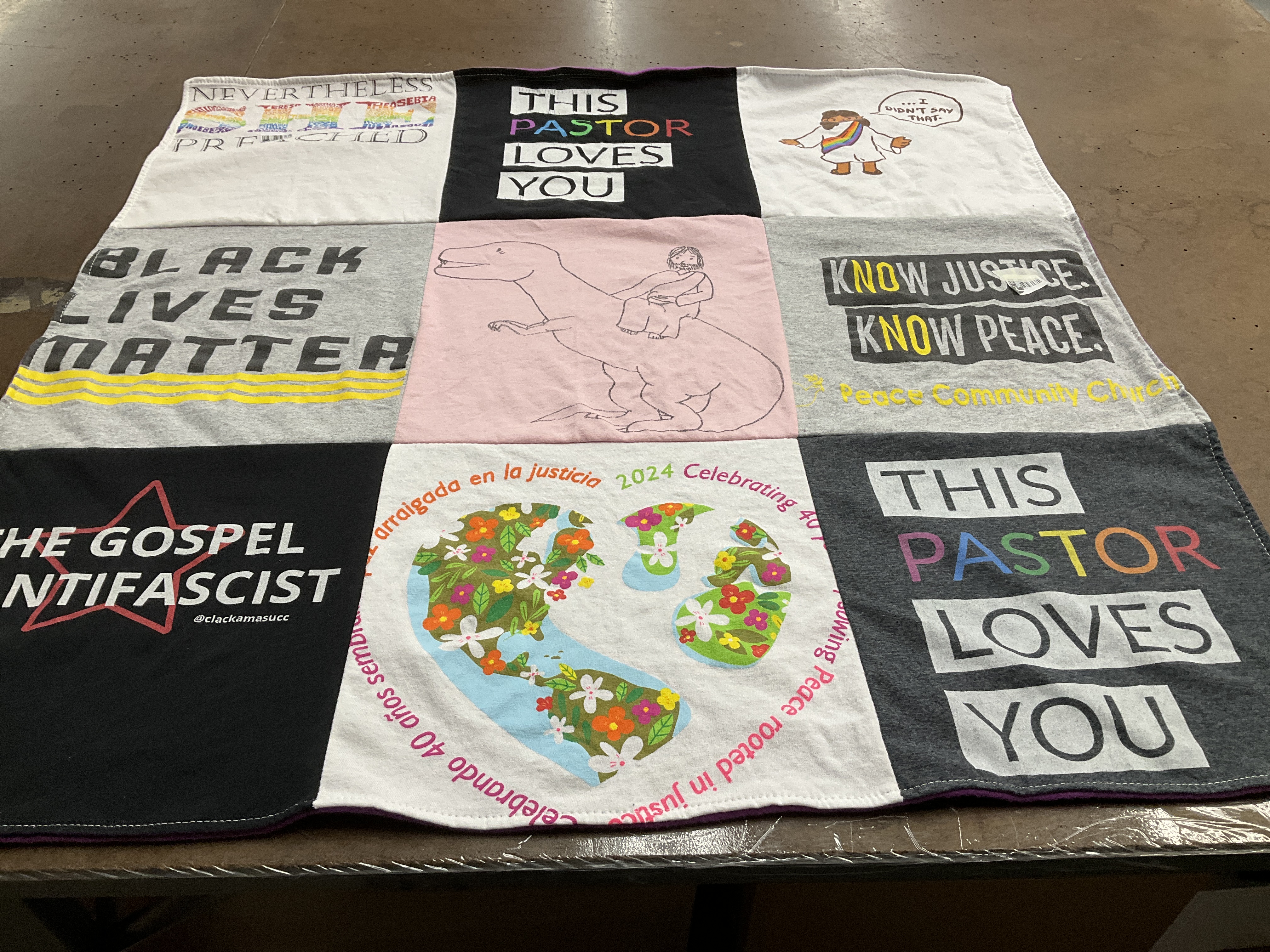T-shirt quilt with social justice, community activism themes by Anita from WA