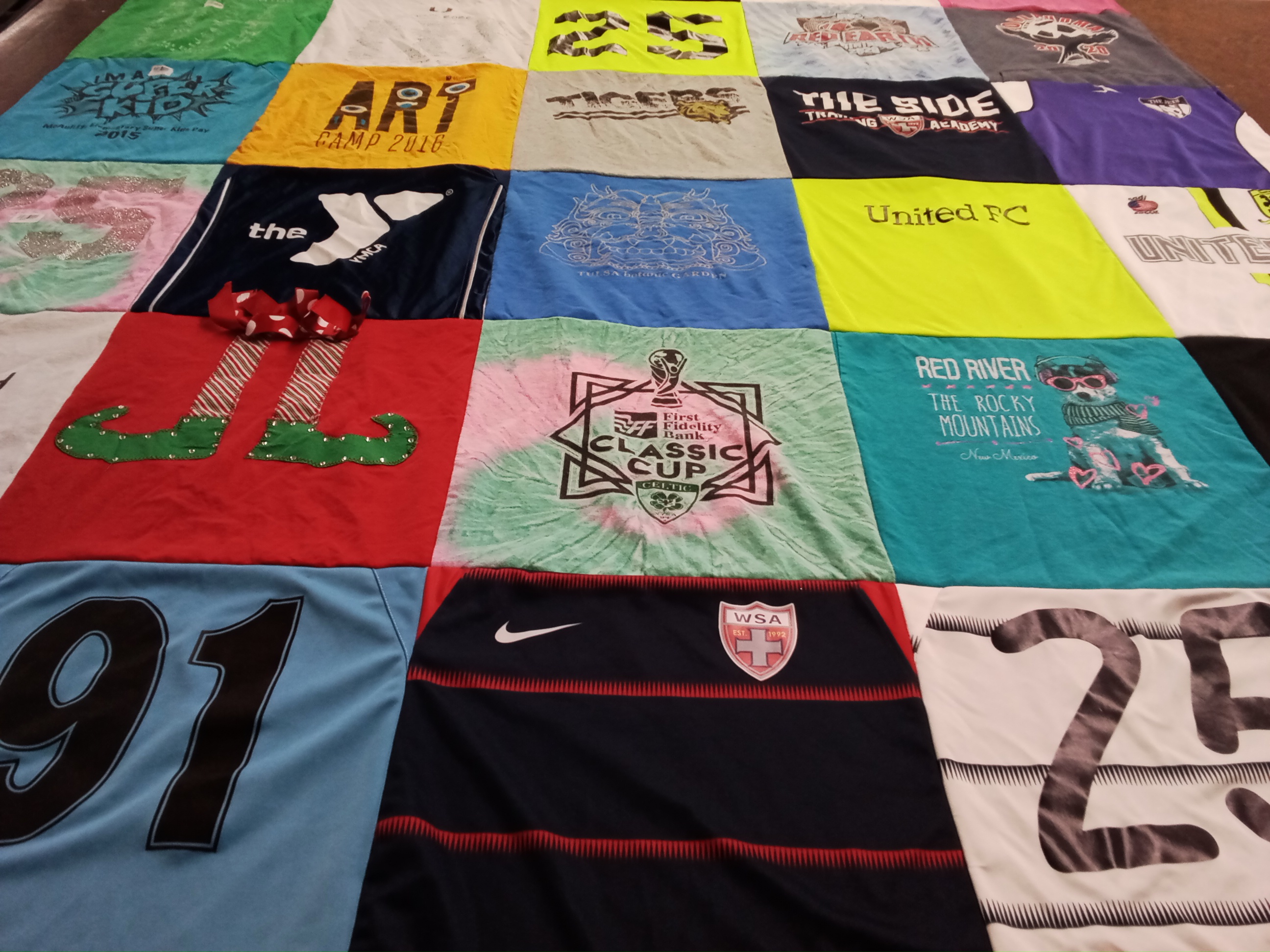 T-shirt quilt with soccer, sports themes by Charity from OK