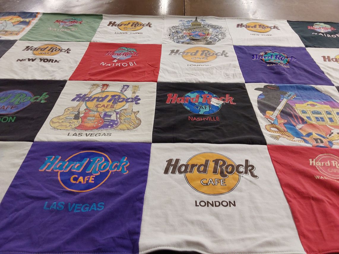T-shirt quilt with music, travel themes by Jennifer from FL