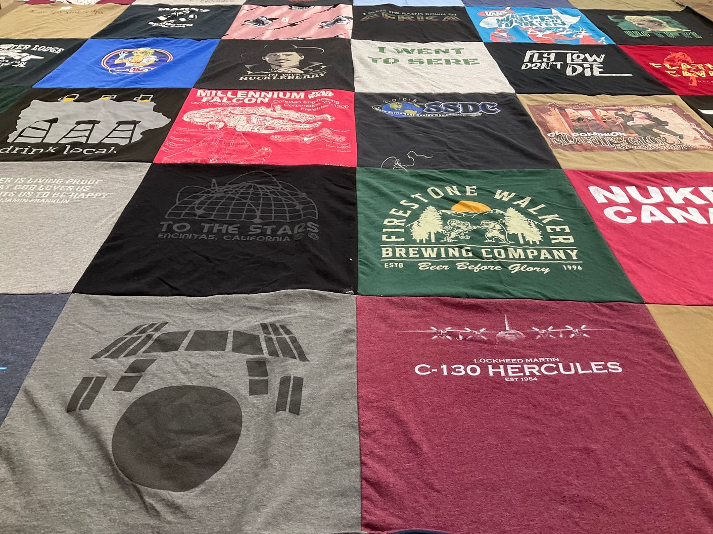T-shirt quilt with brewing, space themes by Nick from IA