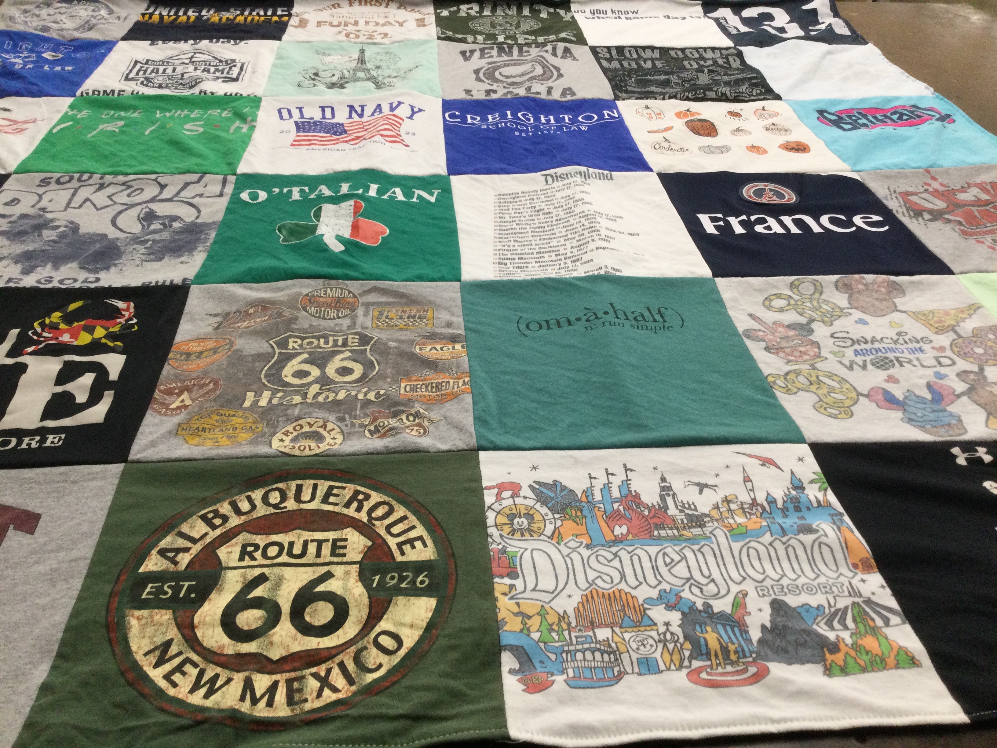 T-shirt quilt with travel, history themes by Lexi from NE