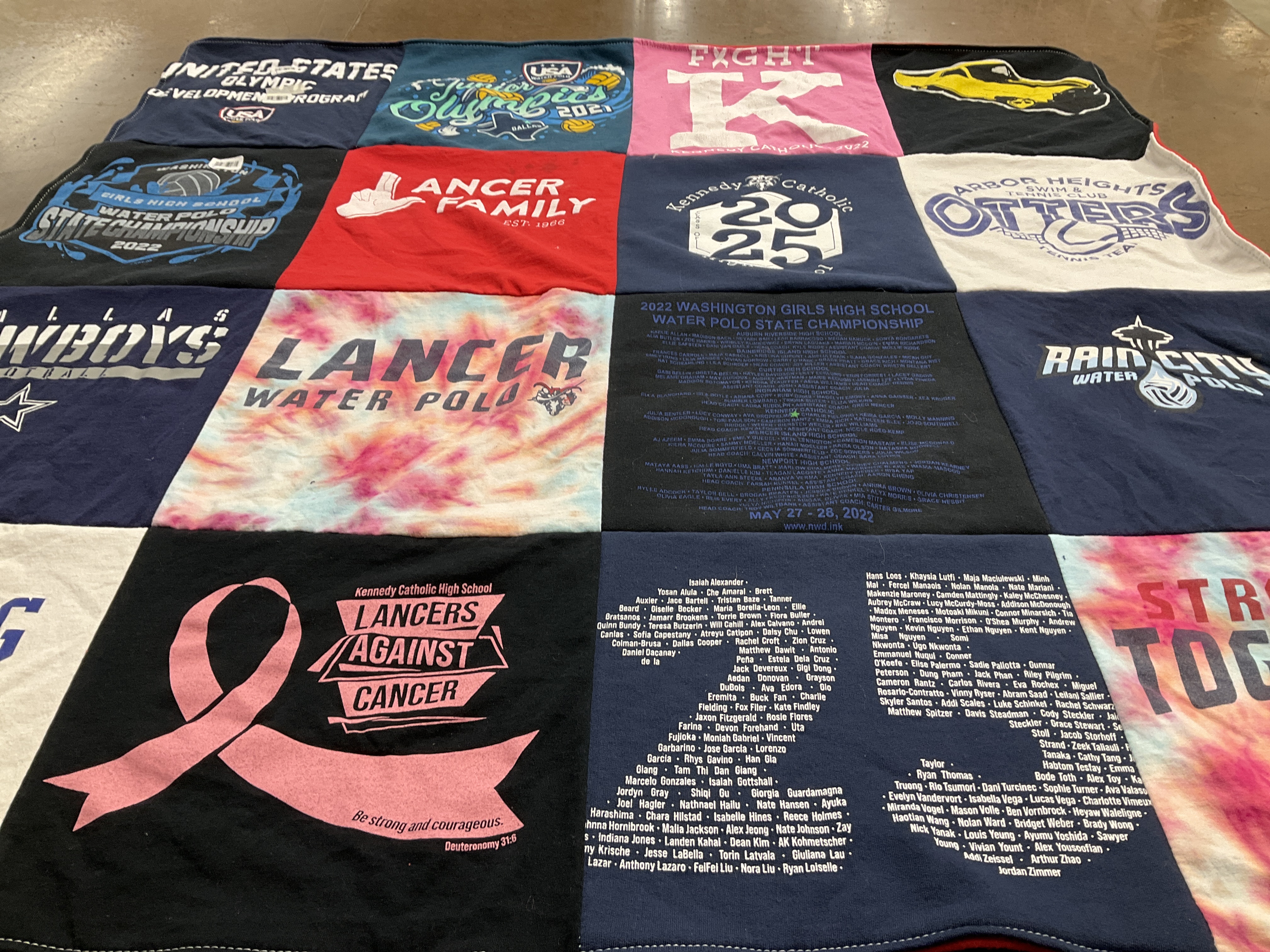 T-shirt quilt featuring lancer water polo, rain city water polo by Lonjina from WA