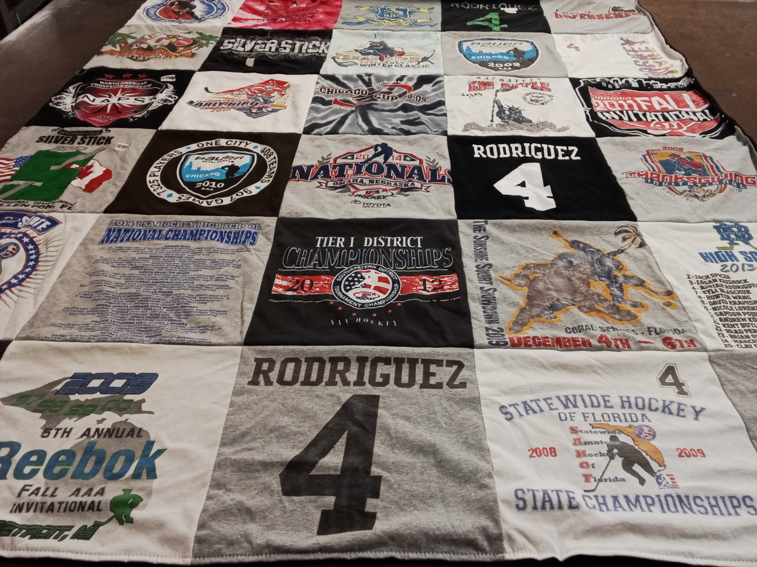 T-shirt quilt featuring hockey by Adrian from FL
