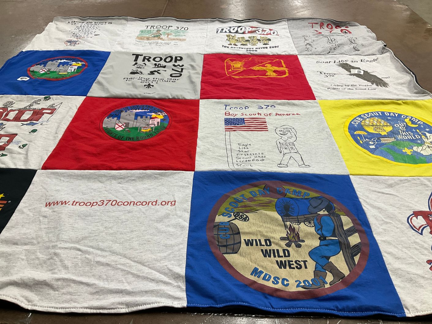 T-shirt quilt with scouting, outdoor activities themes by Lori from CA