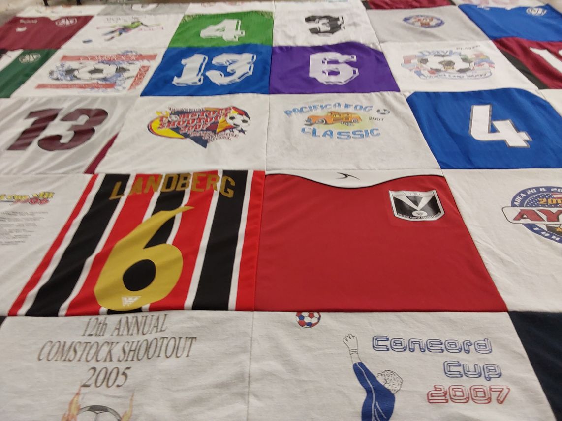 T-shirt quilt with soccer, sports themes by Lori from CA