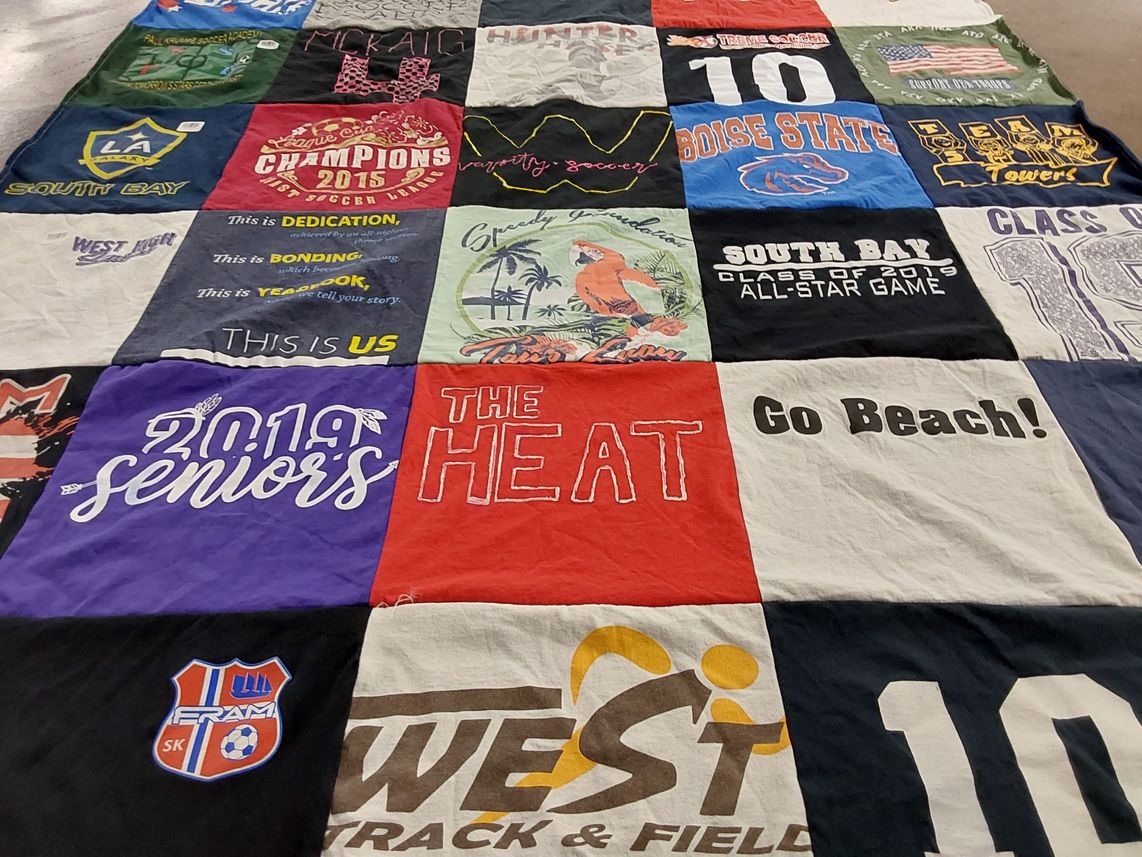 T-shirt quilt featuring track and field, soccer team by Dilyce from CA