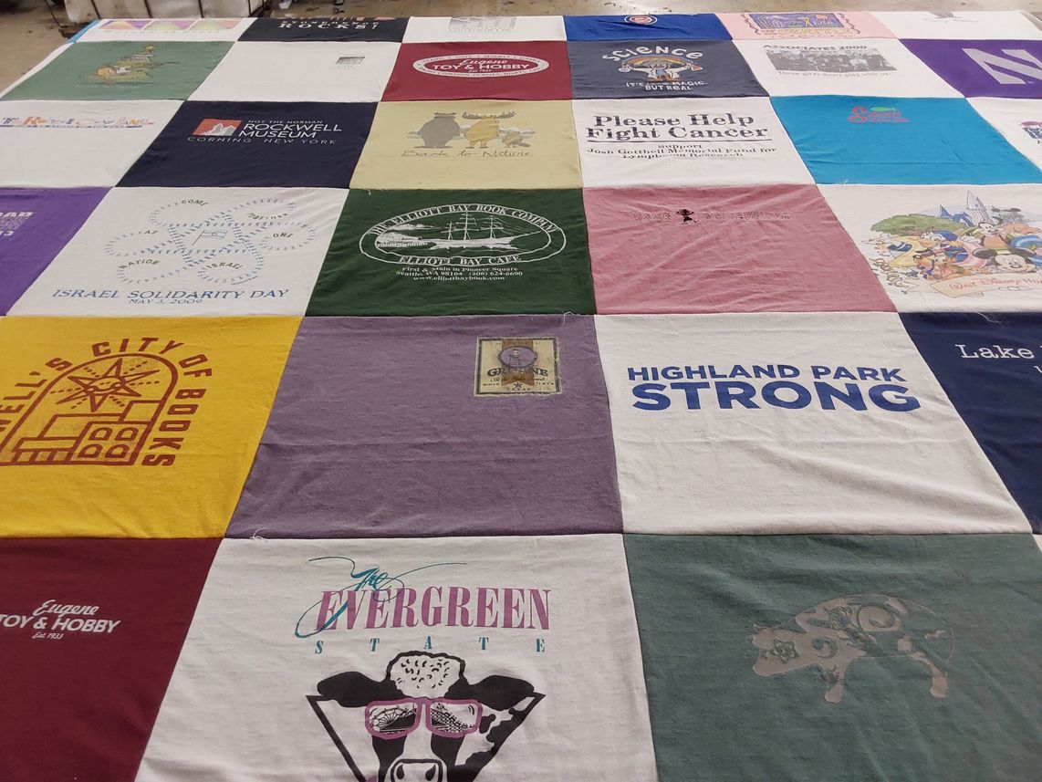 T-shirt quilt with supporting cancer awareness, community events themes by Donna from IL