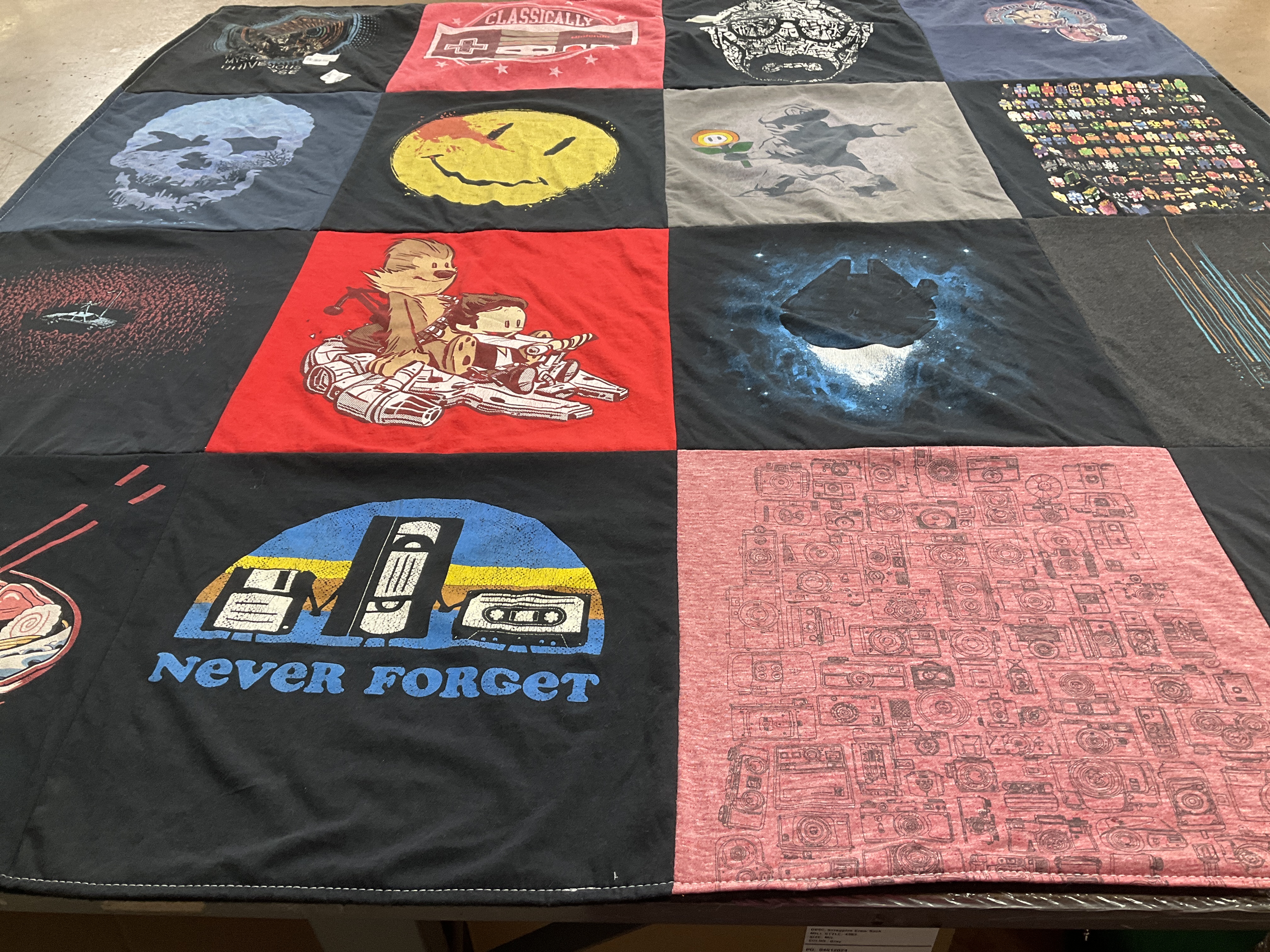 T-shirt quilt with movies, video games themes by Heather from WI