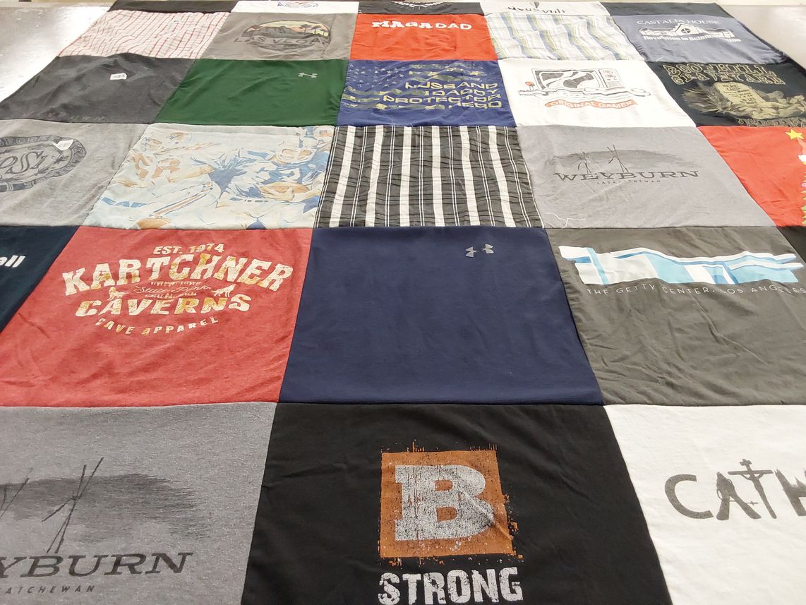 T-shirt quilt with caving, sports themes by Christine from CA