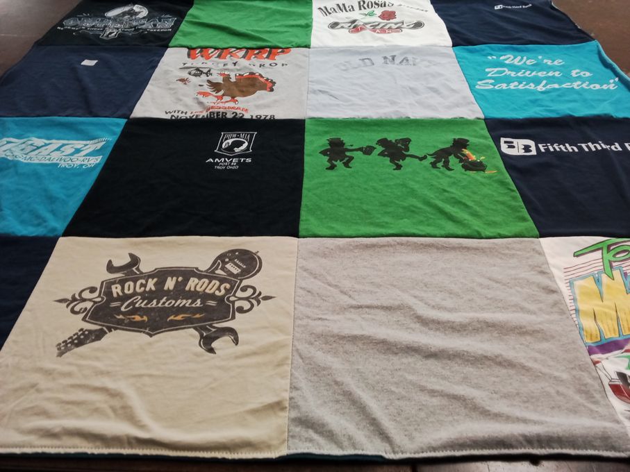 T-shirt quilt with music, automotive themes by Lori from FL