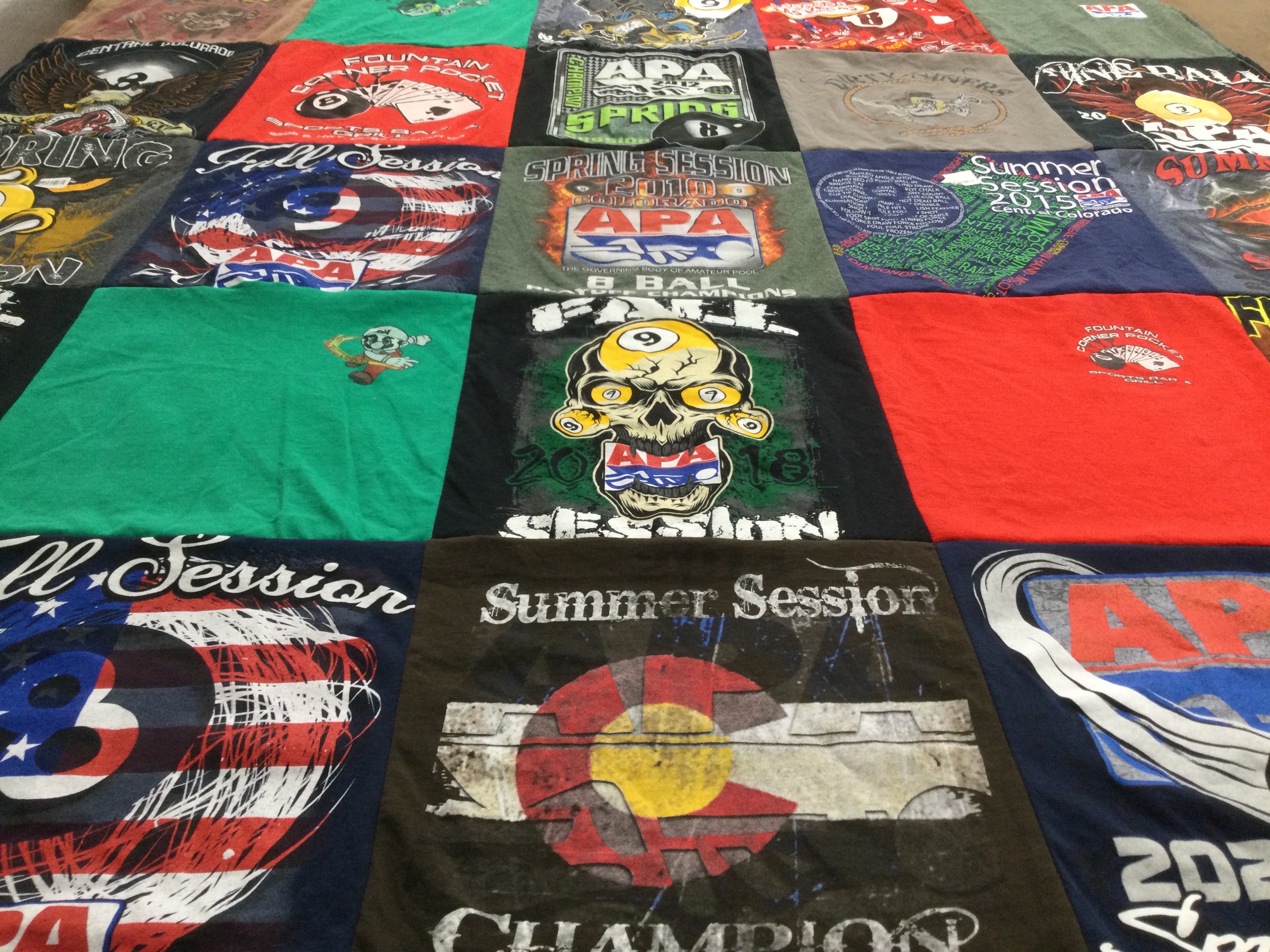 T-shirt quilt with sports, community events themes by Vonda from TX