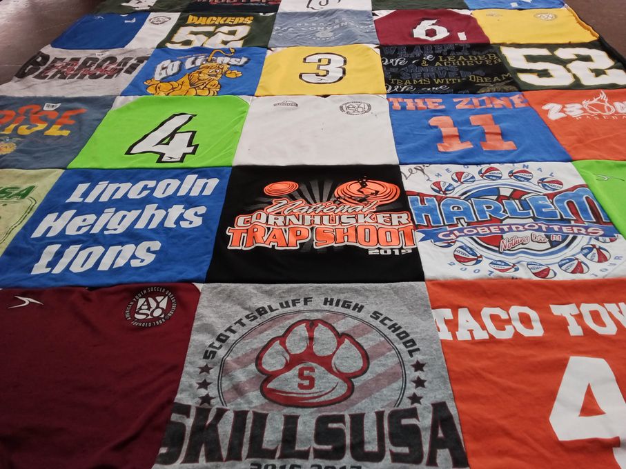 T-shirt quilt featuring lincoln heights lions, harlem globetrotters by Connie from NE