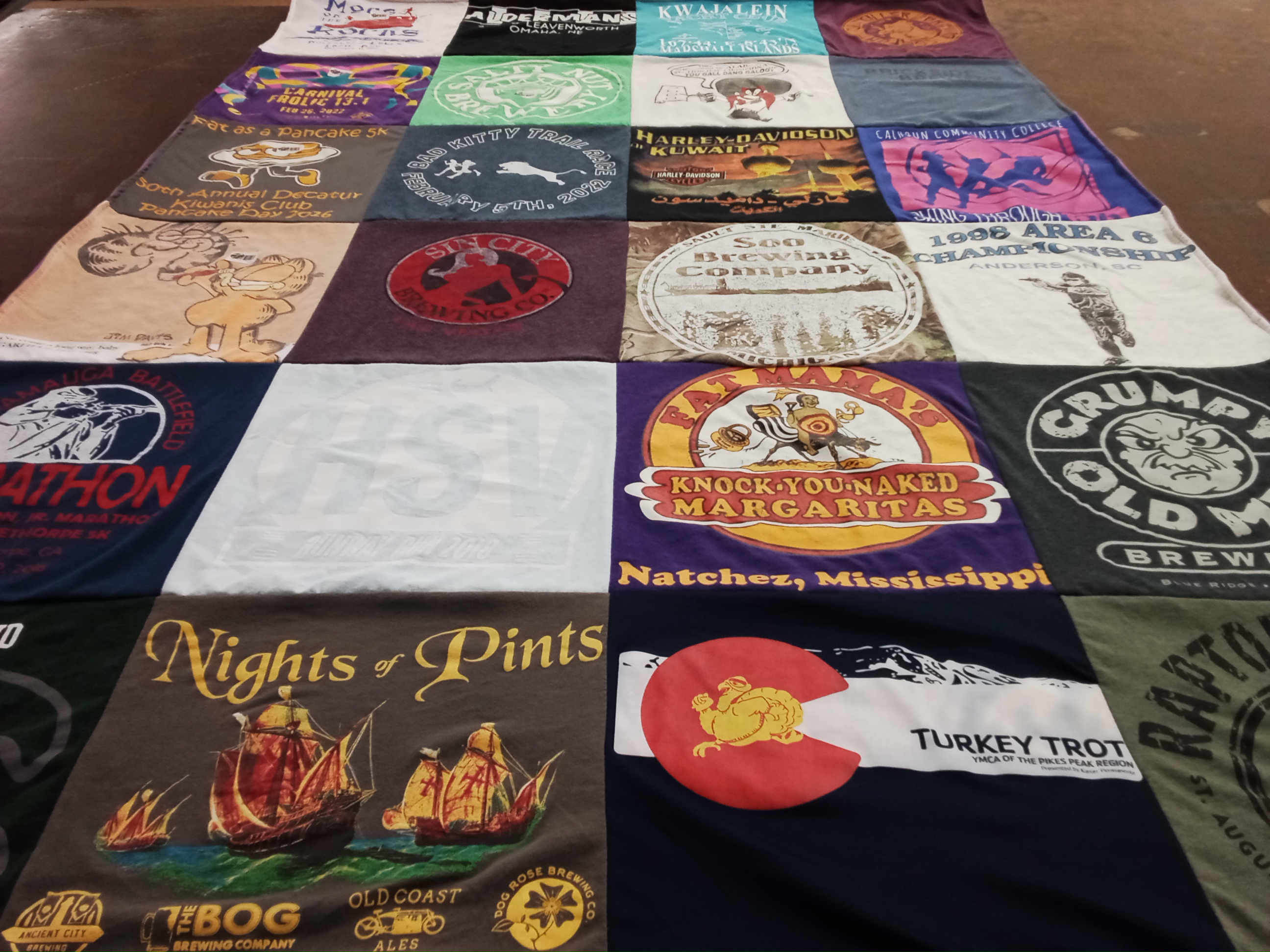 T-shirt quilt with brewing, events themes by Paula from AL