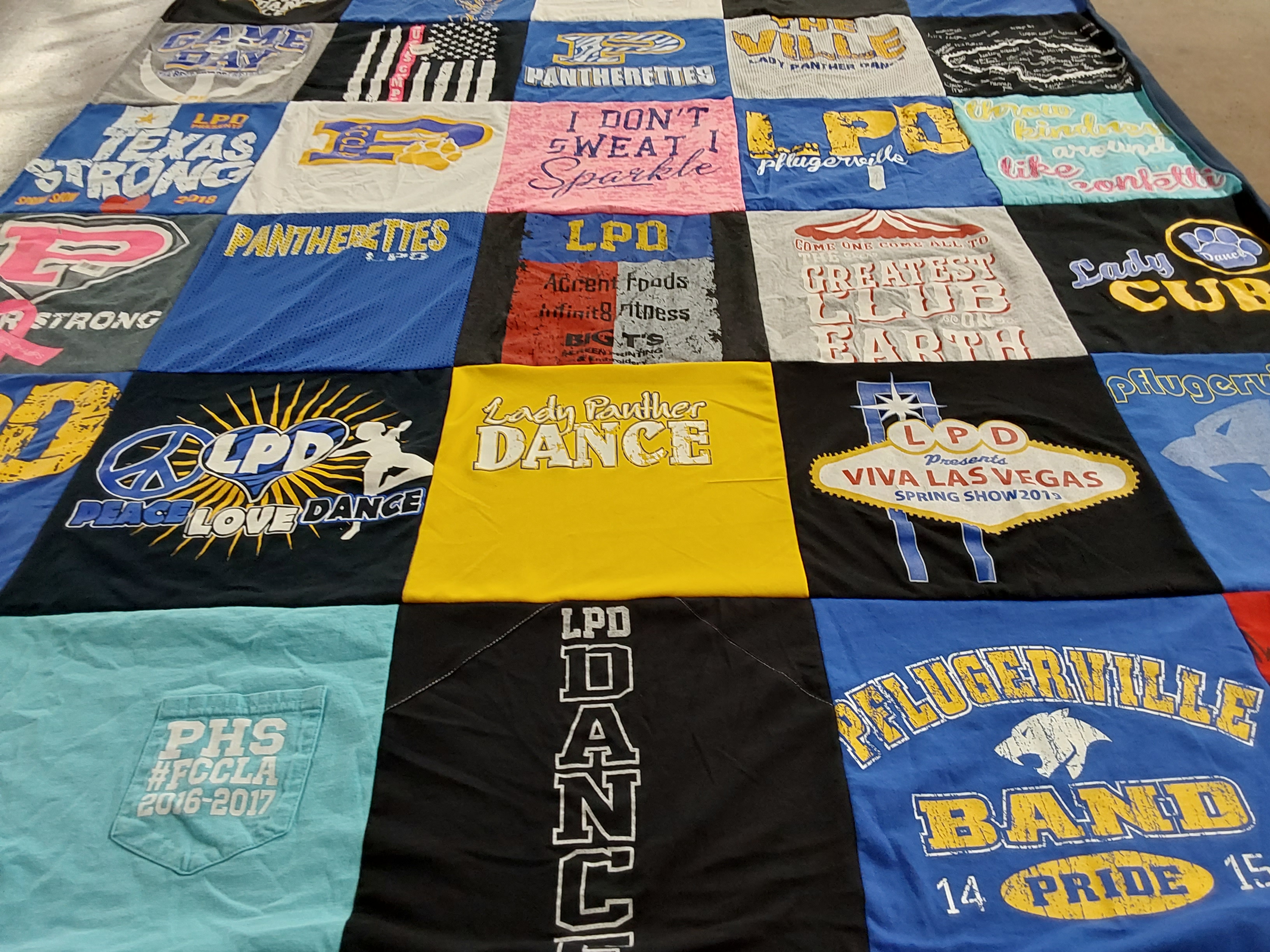 T-shirt quilt featuring pflugerville band, lady pantherettes by Debrah from TX
