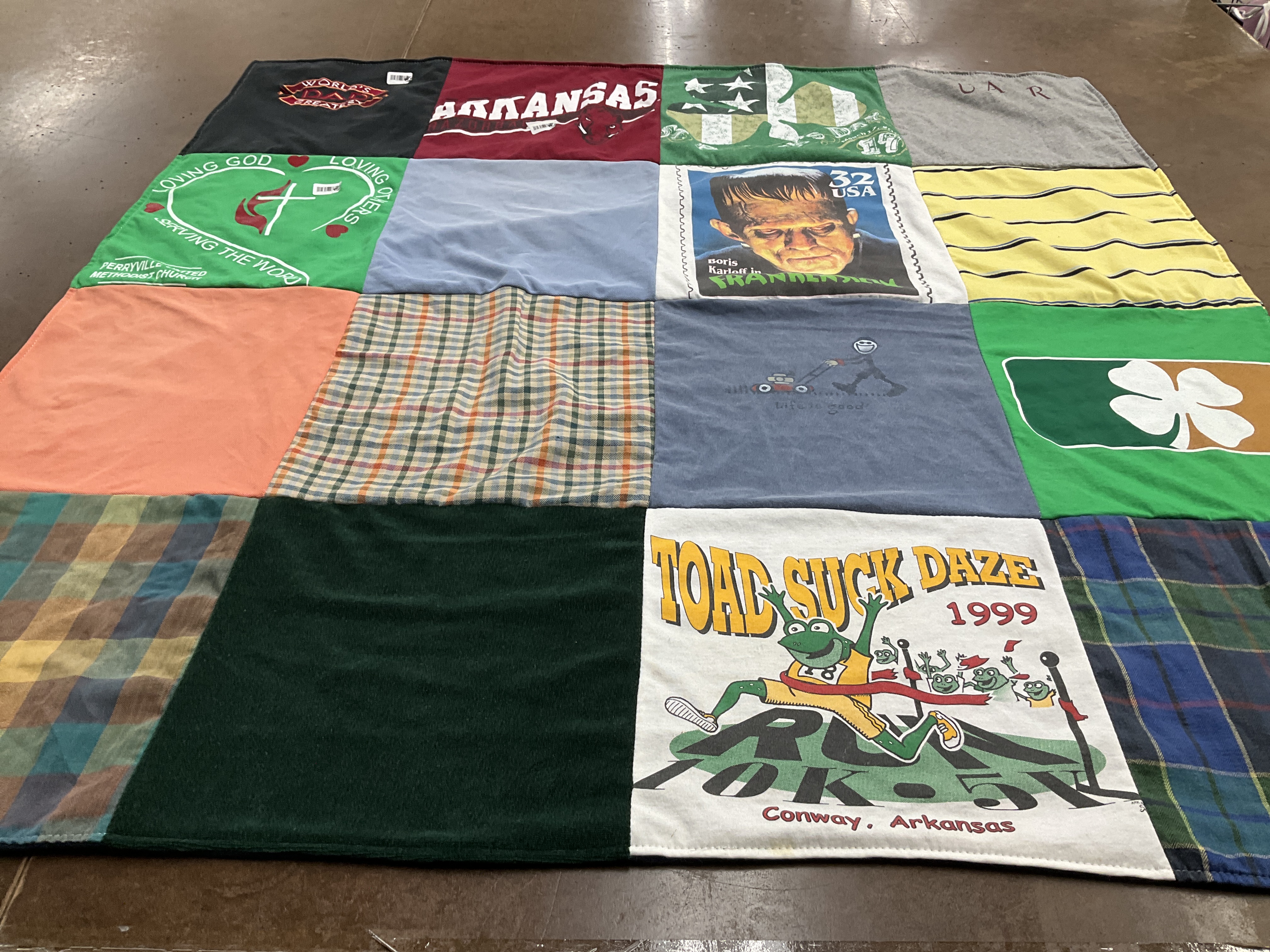 T-shirt quilt with local events, community gatherings themes by Carla from AR