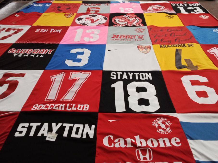 T-shirt quilt with sports, soccer themes by Constance from NY