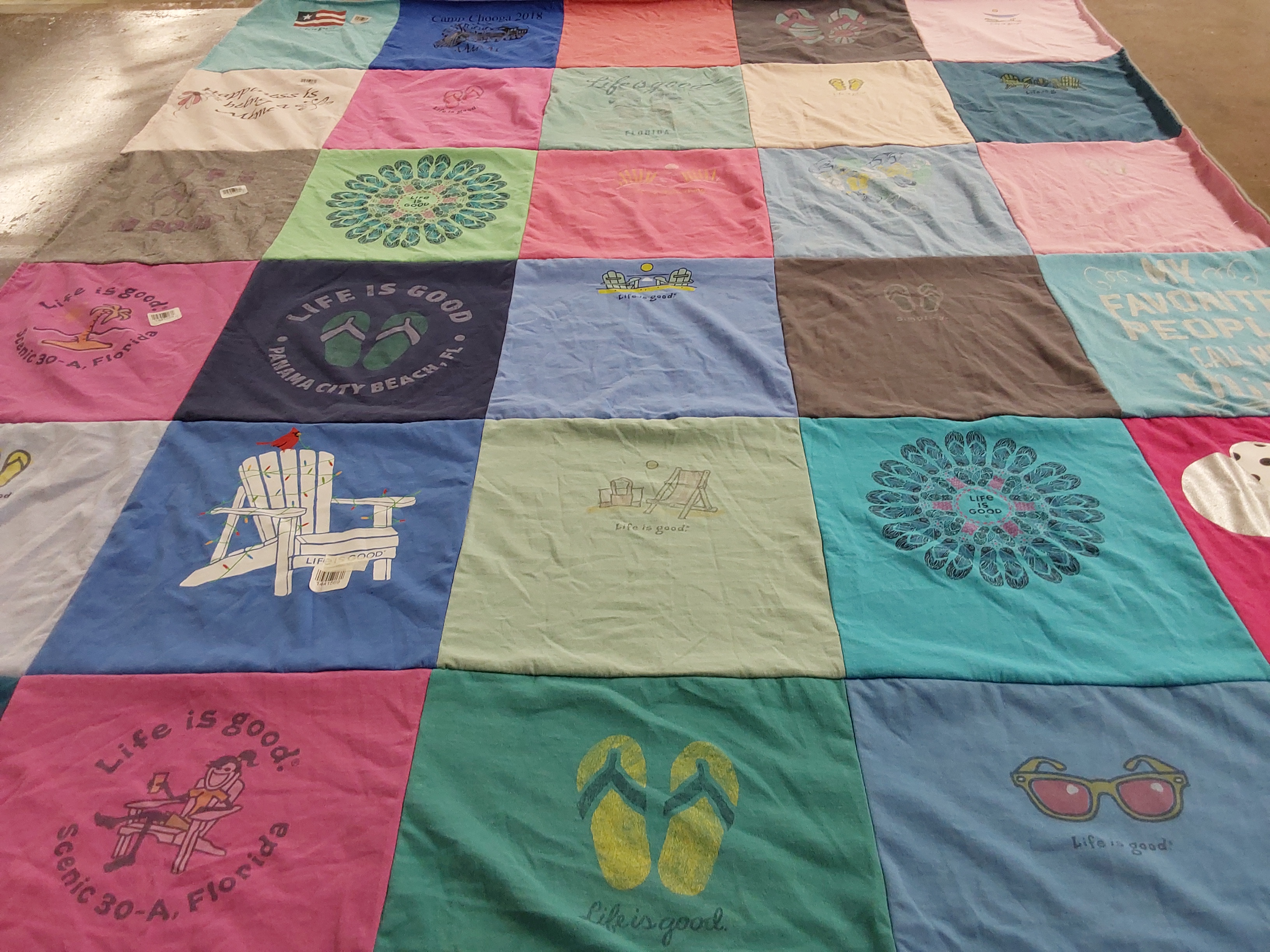 T-shirt quilt with beach activities, travel themes by Holly from TN