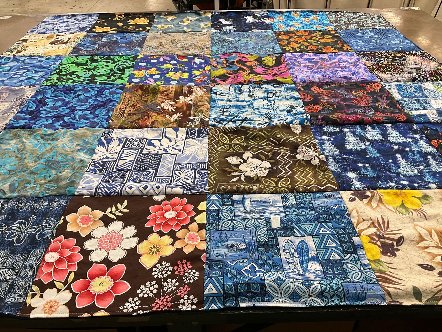 T-shirt quilt with quilting, sewing themes by Cathy from CA